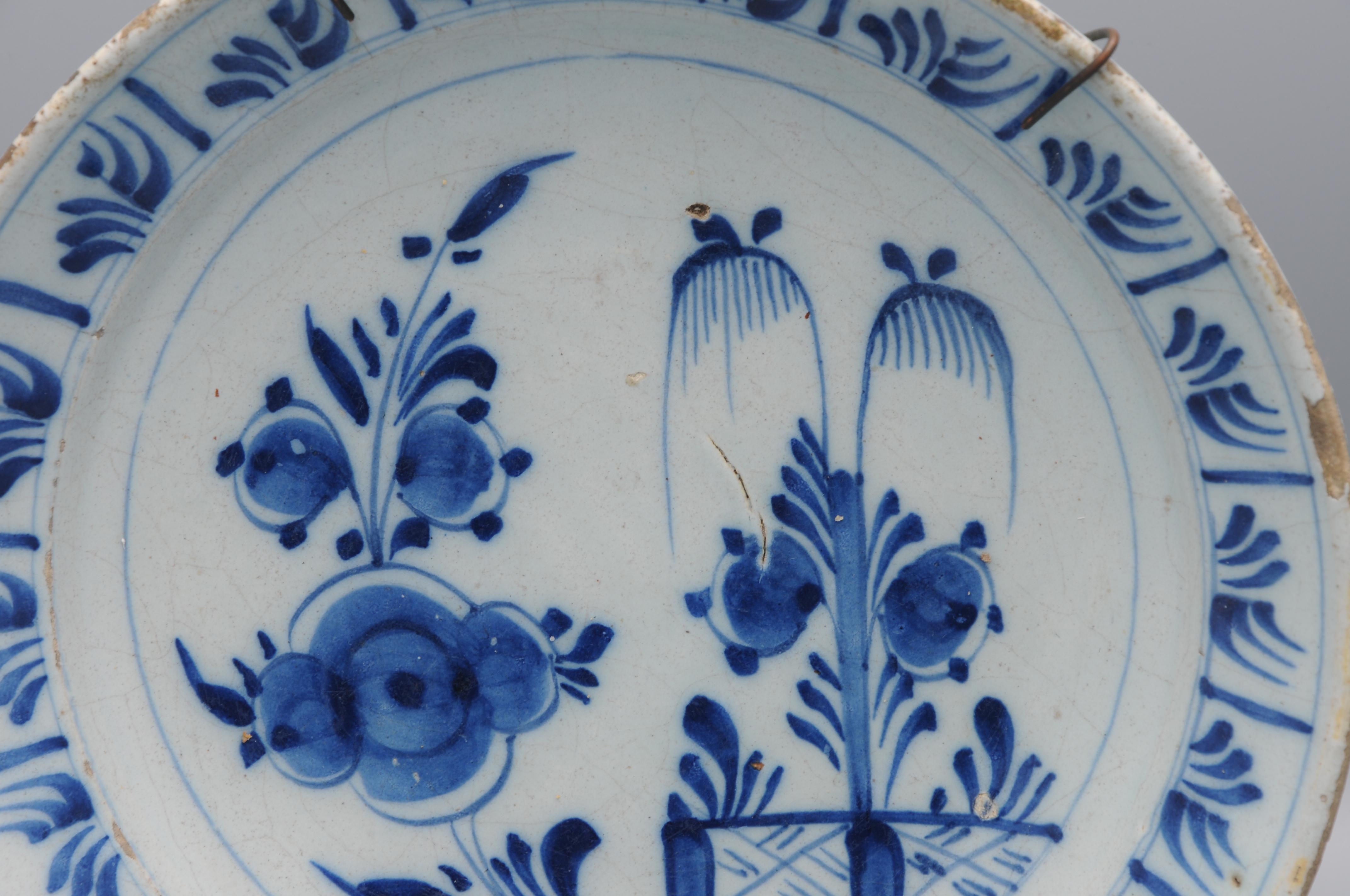 Néerlandais Faïence de Delft  - Assiette de Delft bleu et blanc du 18e siècle, dite 