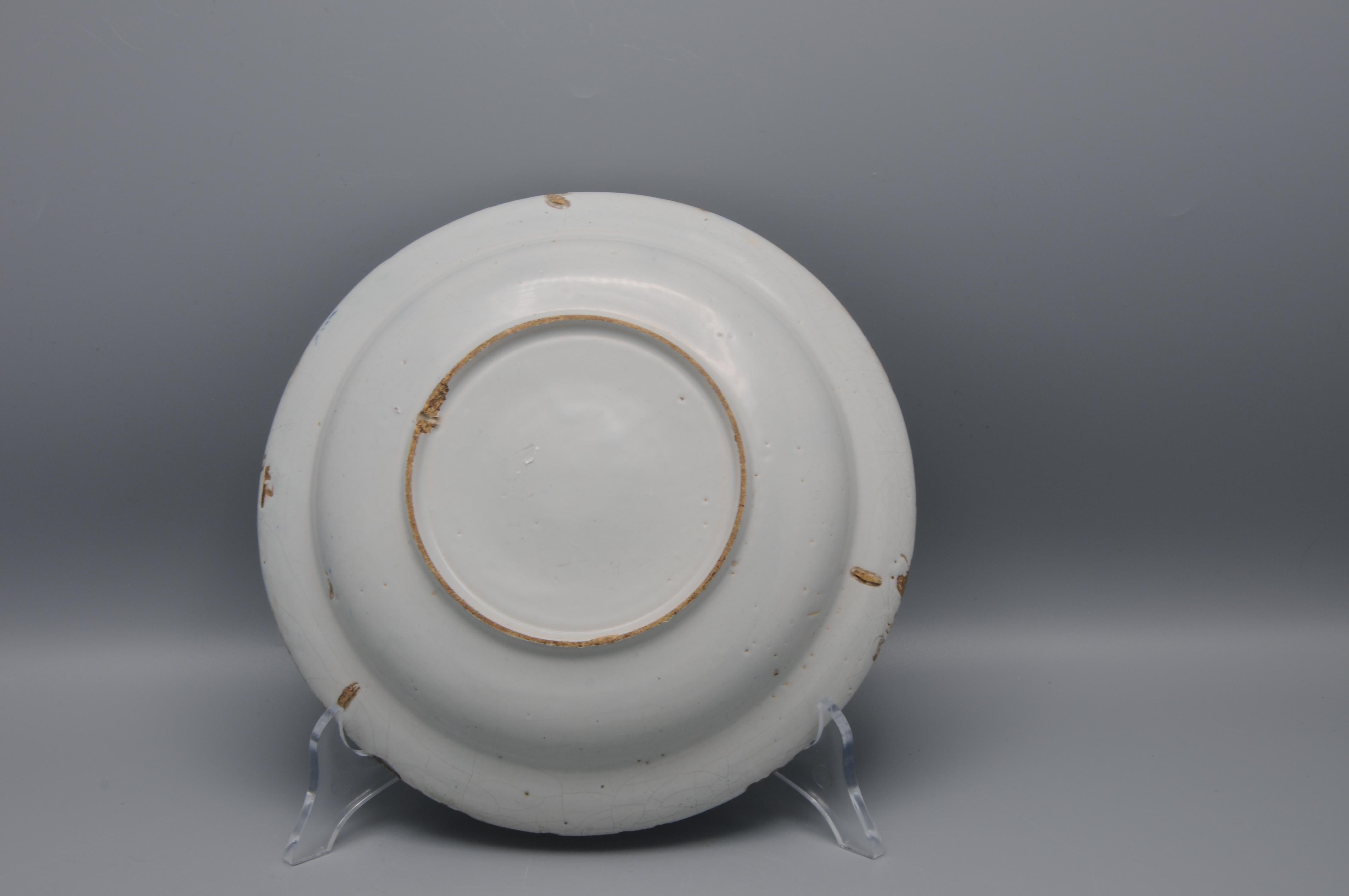 Poterie Faïence de Delft  - Assiette de Delft bleu et blanc du 18e siècle à décor de Chinoiserie en vente