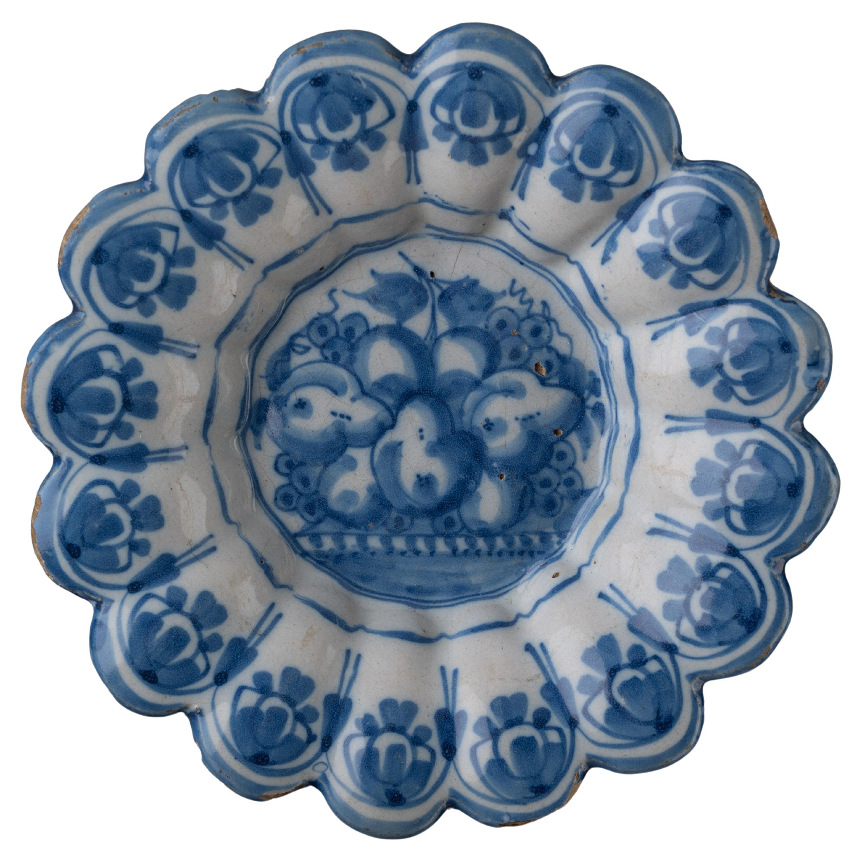 Delft Blue and White Lobed Dish with Fruit Still Life Northern Netherlands, 1665 For Sale