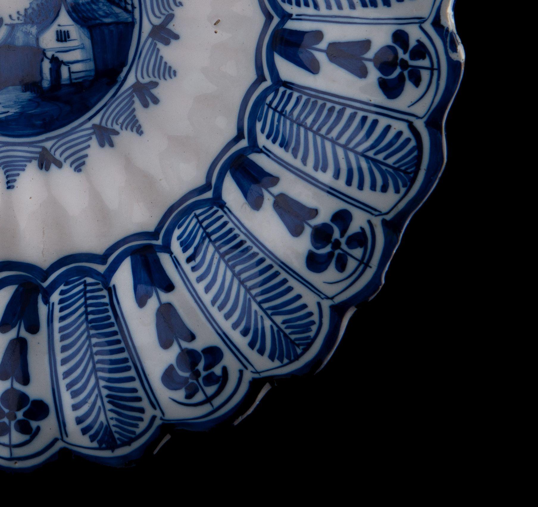Glazed Delft Blue and White Lobed Dish with Landscape, Northern Netherlands, 1650-1680 For Sale