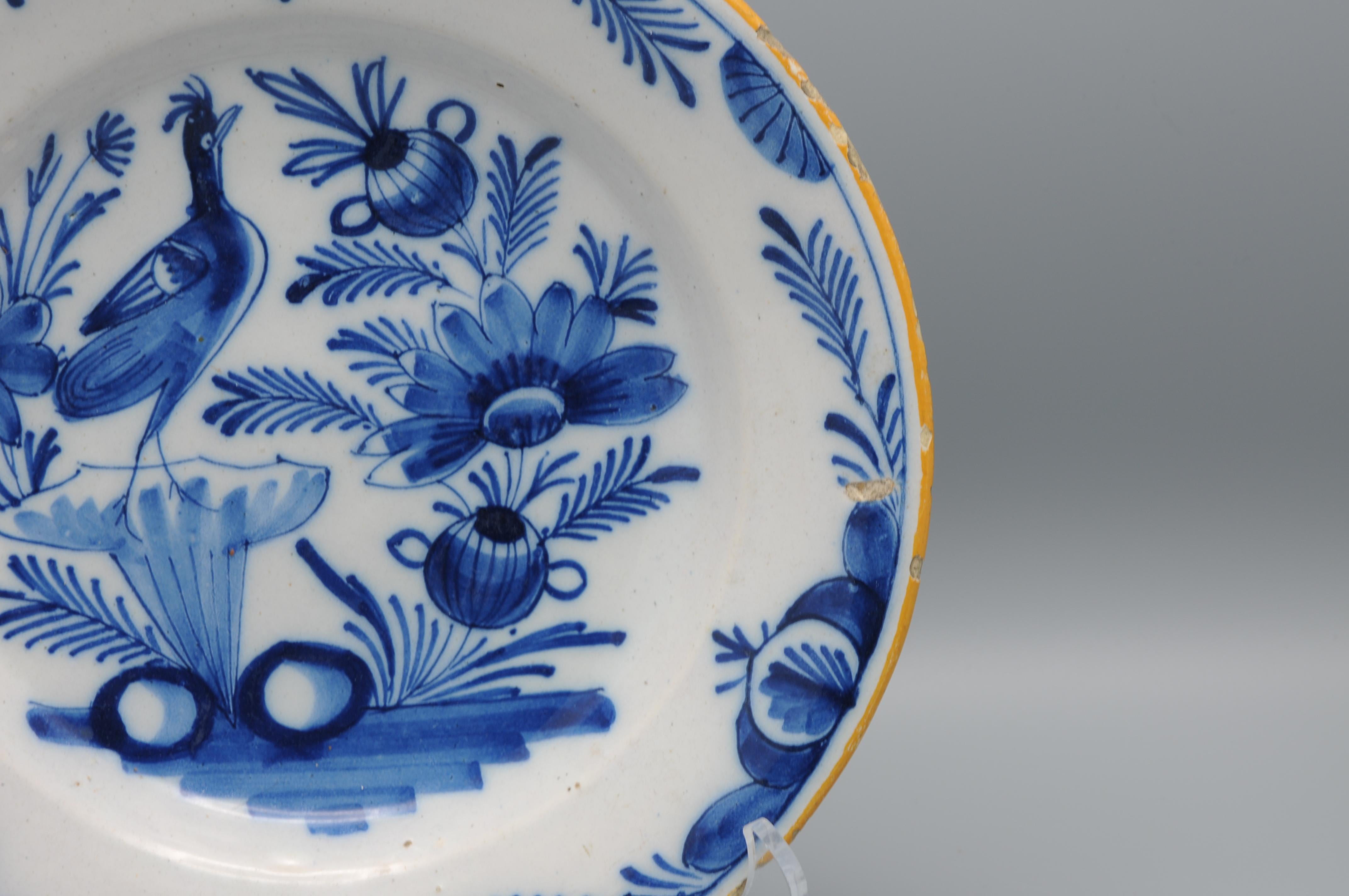 Néerlandais Assiette bleue et blanche de Delft avec un oiseau - début du 19e siècle en vente