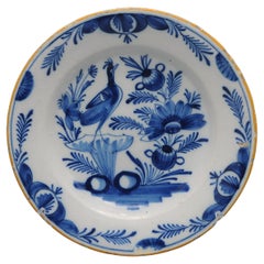 Delft blue and white plate with a bird - early 19th century