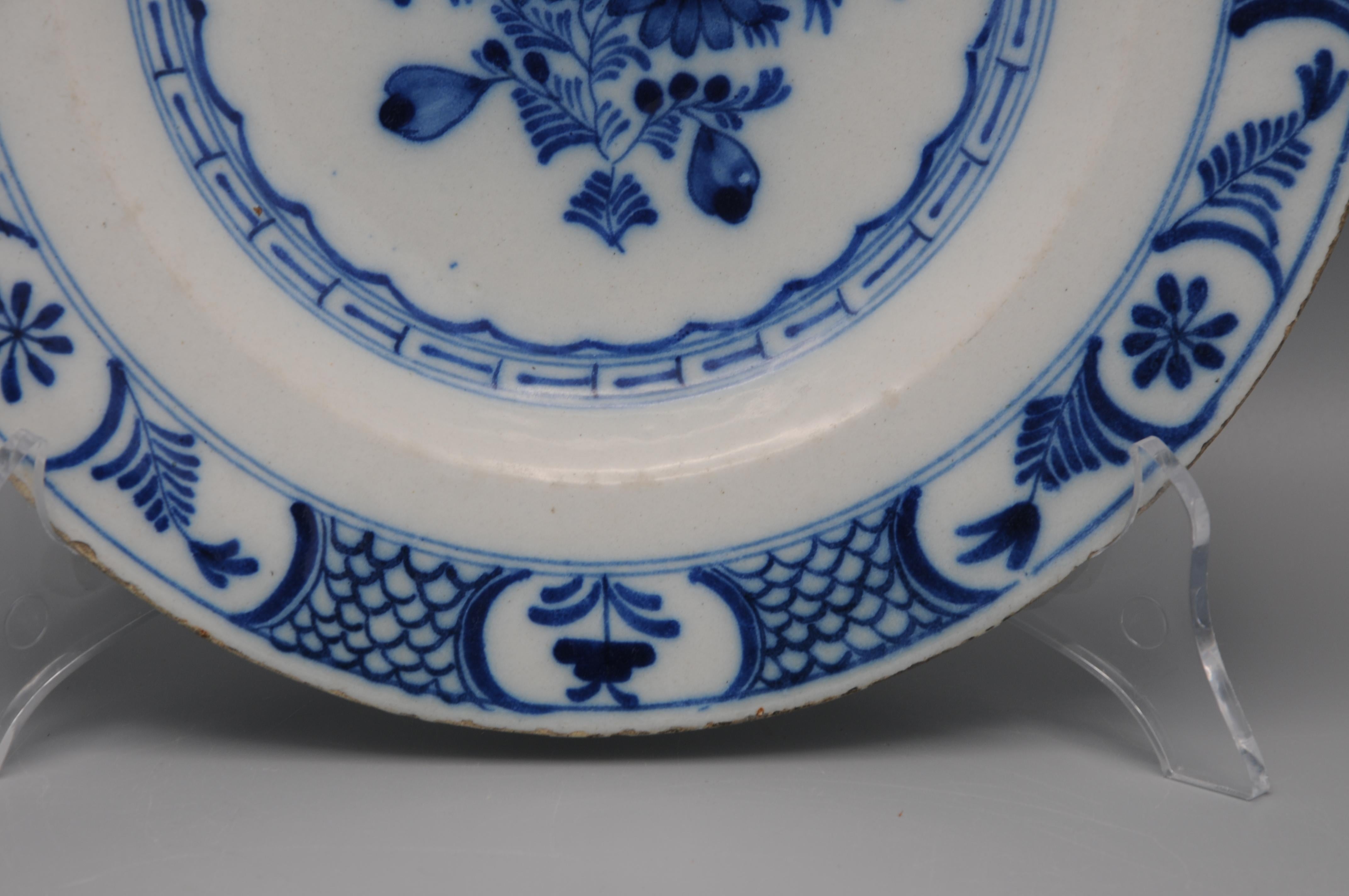 Glazed Delft - Blue and white plate with floral decoration - 18th century For Sale