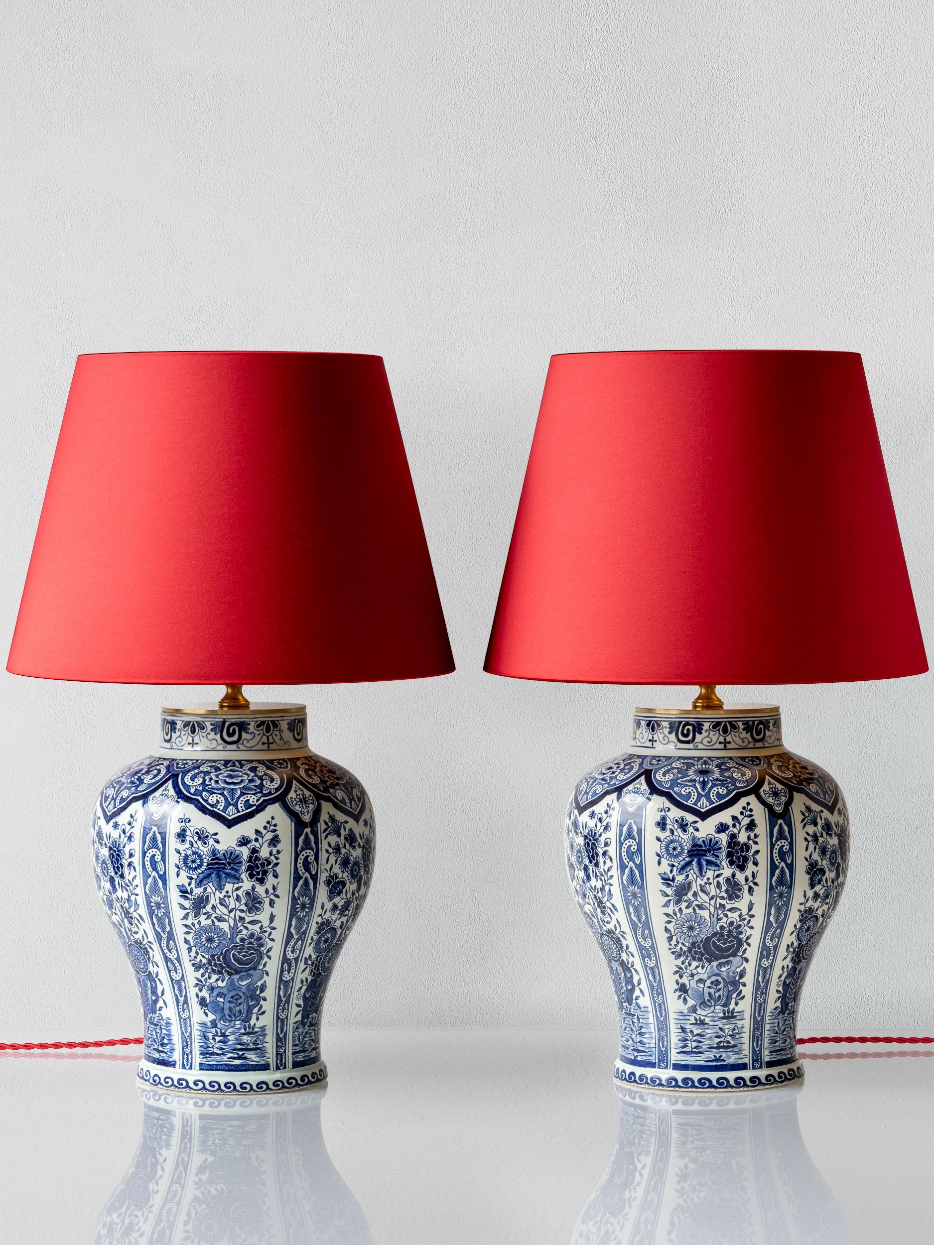 Meet Scarlet and Rhett! These one-of-a-kind lamps have been lovingly handcrafted from two vintage vases designed by Boch Frères Keramis in La Louviere, Belgium for Royal Sphinx (formerly Petrus Regout) in Maastricht, the Netherlands. Paired with