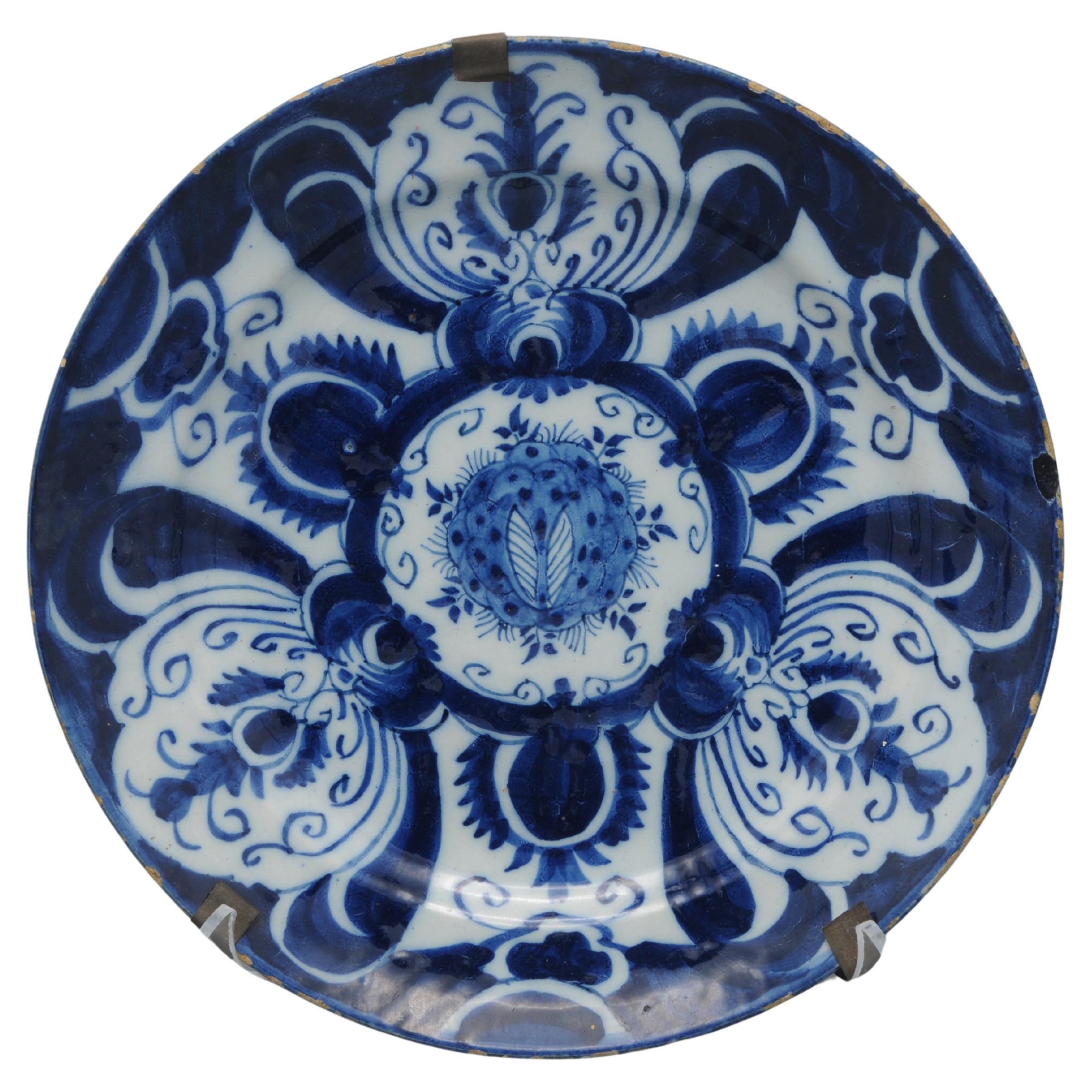 Delft - Blue Delftware plate with stylized tulip decor - 18th century For Sale
