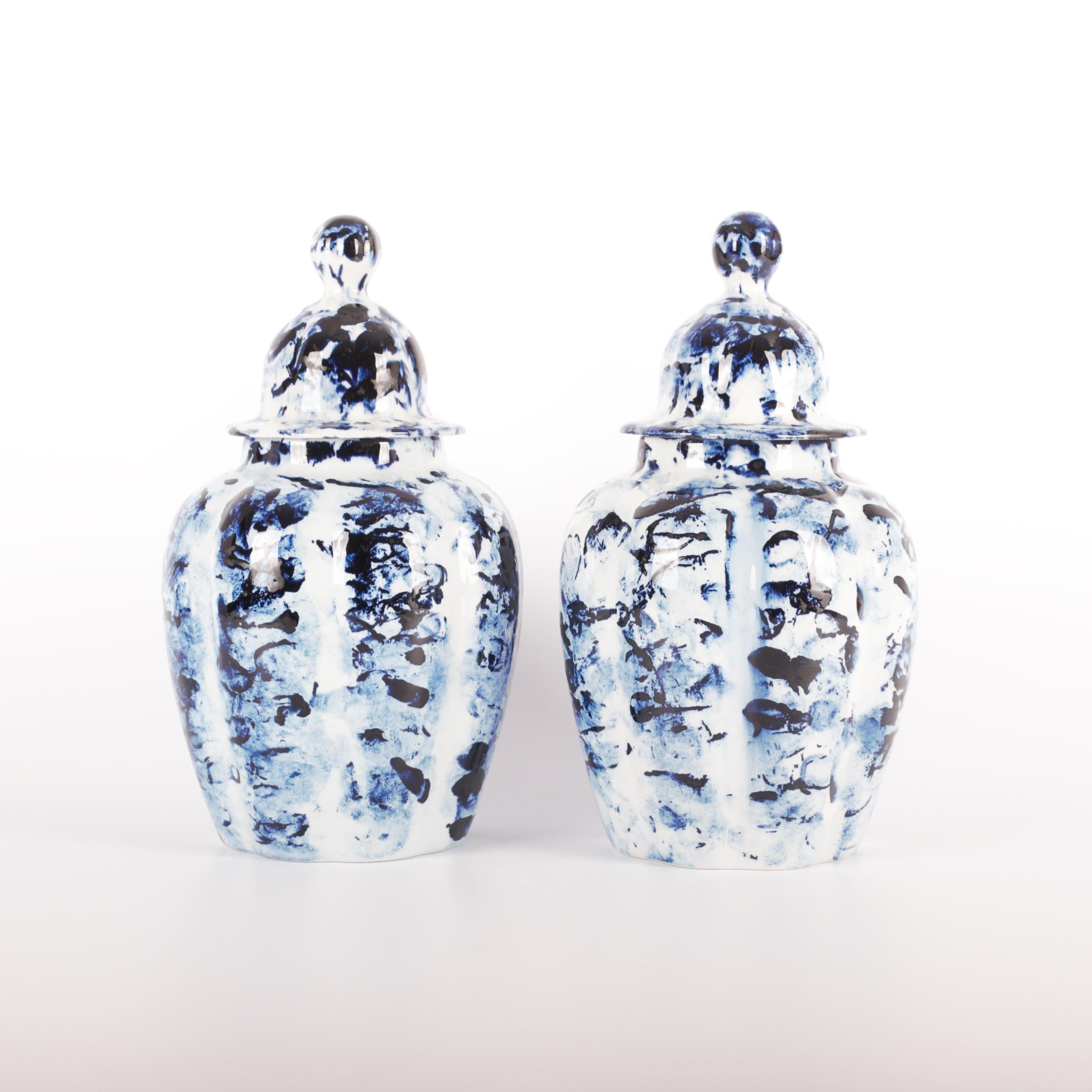 The set of two Delft Blue Vases with Lid (Pul, 30cm high) is available as an exclusive Personal Edition, Marcel Wanders' label carrying works of a more personal and experimental nature. The pieces of the Delft Blue series are unlimited unique by