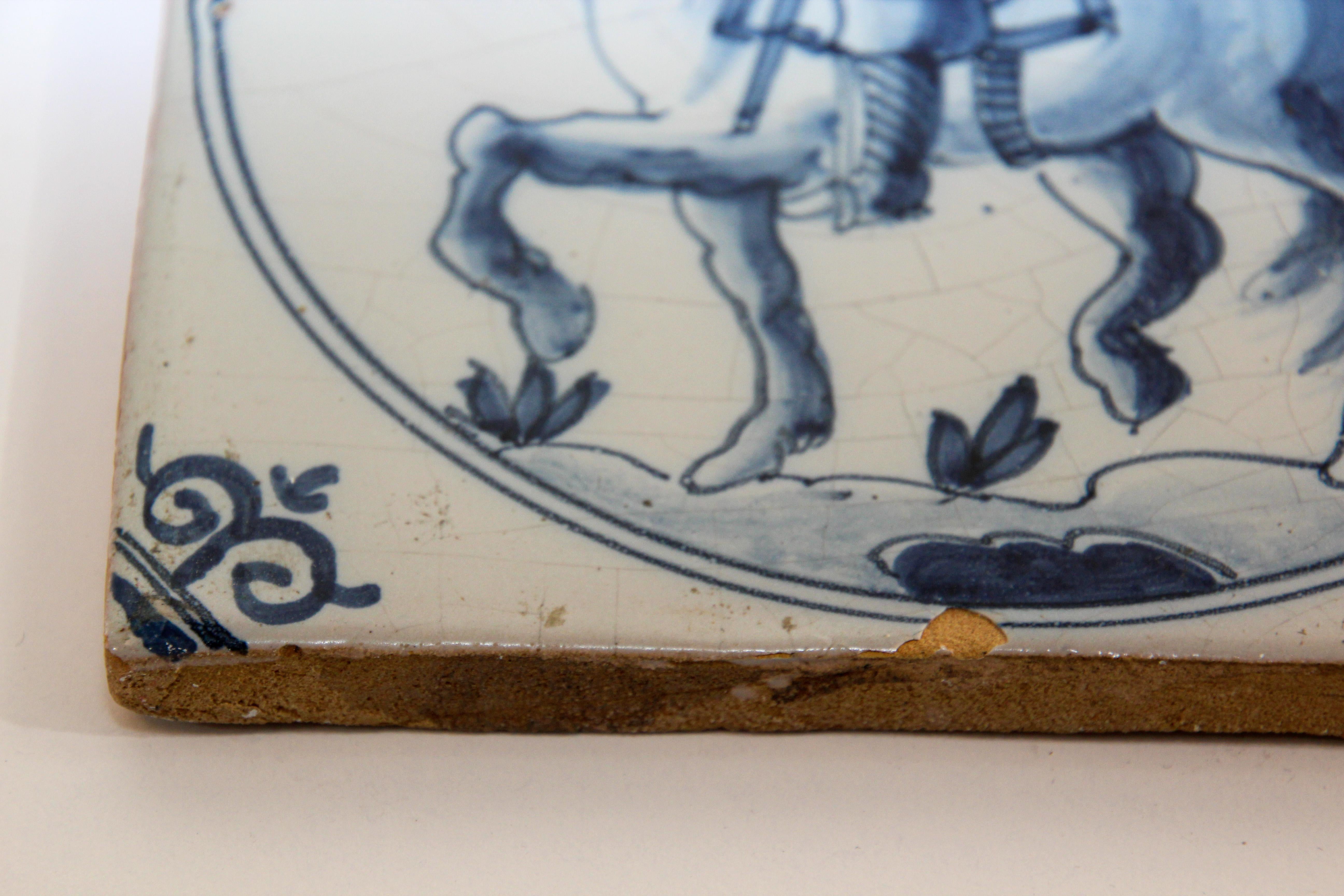 Hand-Crafted Delft Ceramic Decorative Tile Featuring a Man on Horse For Sale