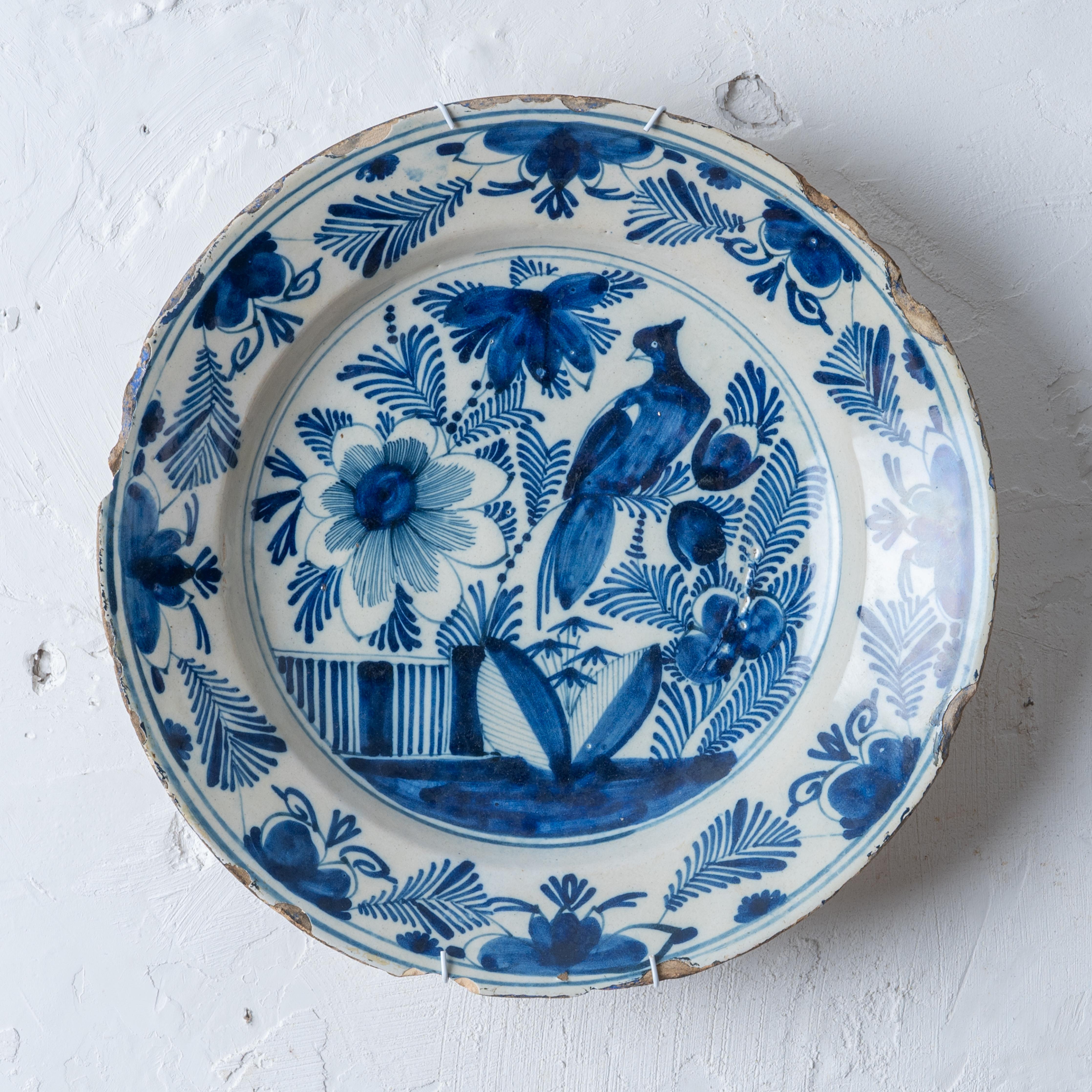 A Delft charger, early 18th Century.



13 ¾ inches wide by 2 ½ inches tall



