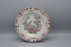 Delft  - 'Chinoiserie' manganese and green floral Delftware plate, 18th century