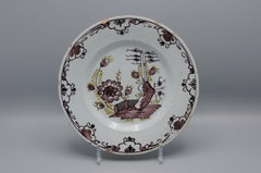 Delft  - 'Chinoiserie' manganese and green floral Delftware plate, 18th century