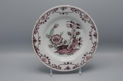 Delft  - 'Chinoiserie' manganese and green floral Delftware plate, 18th century