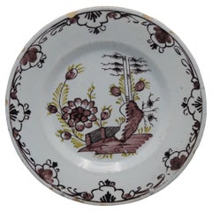 Delft  - 
Chinoiserie
 manganese and green floral Delftware plate, 18th century