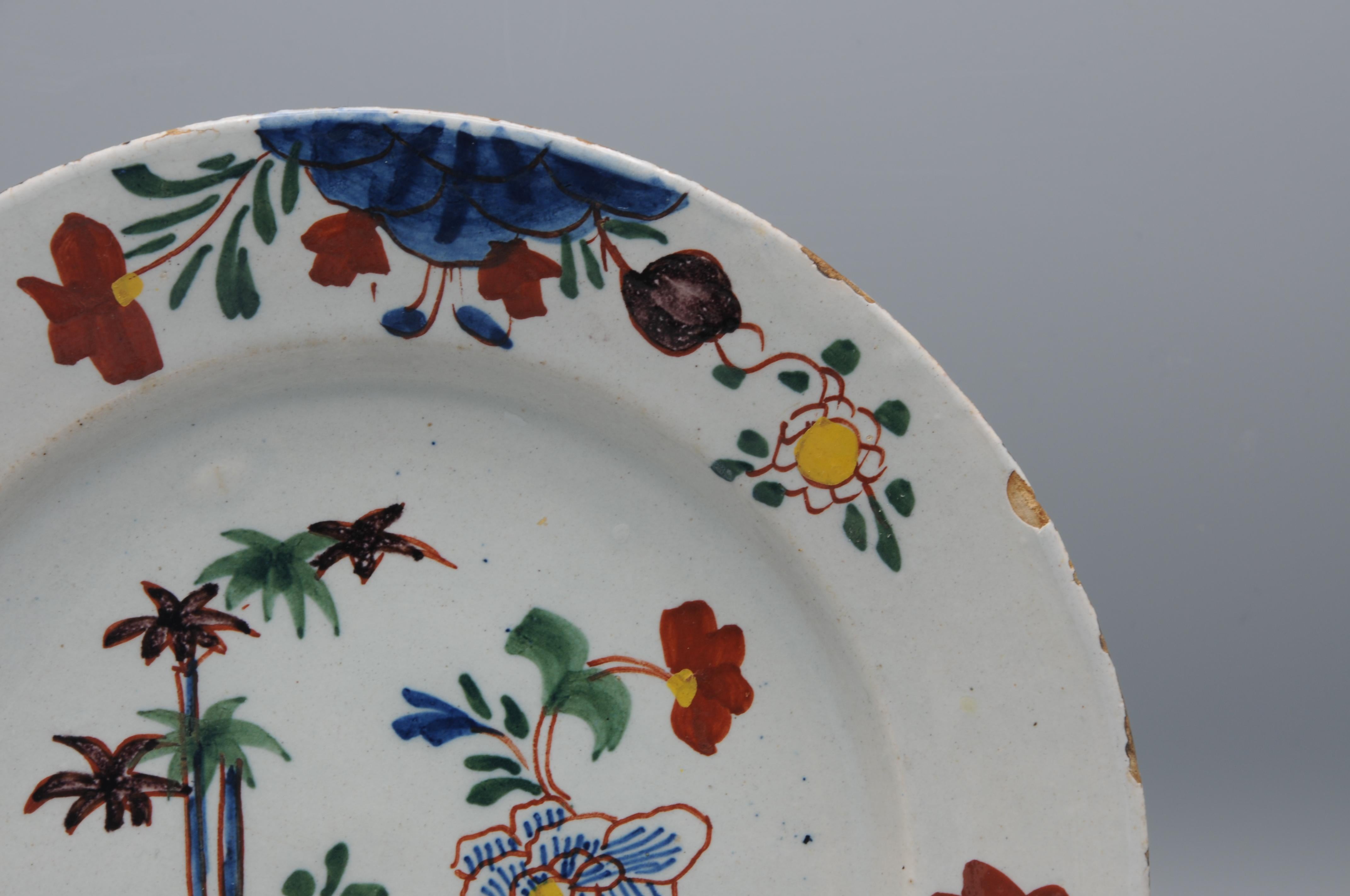 Chinoiserie Delft - Delftware plate with polychrome floral decor - mid 18th century For Sale