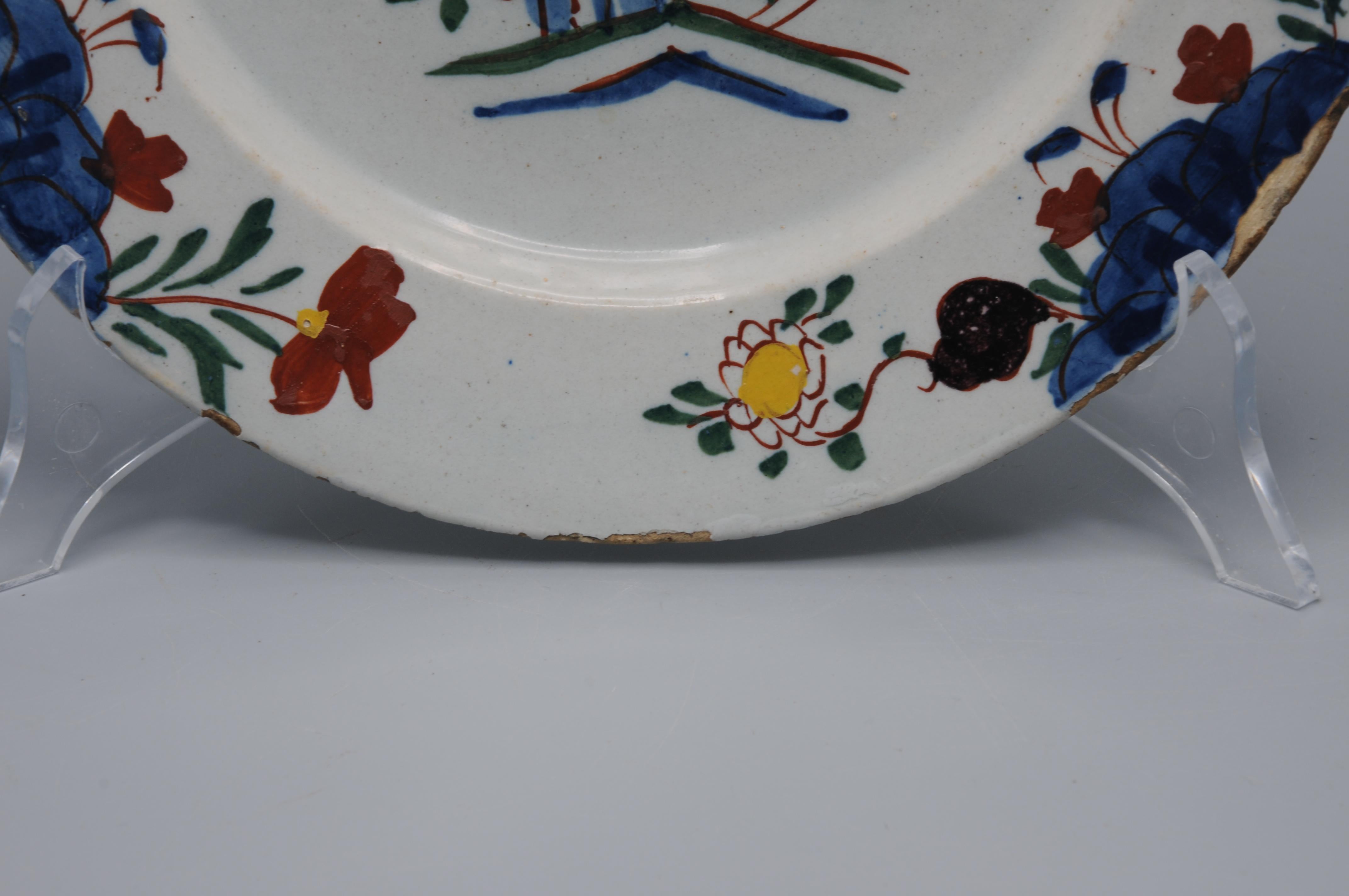 Glazed Delft - Delftware plate with polychrome floral decor - mid 18th century For Sale