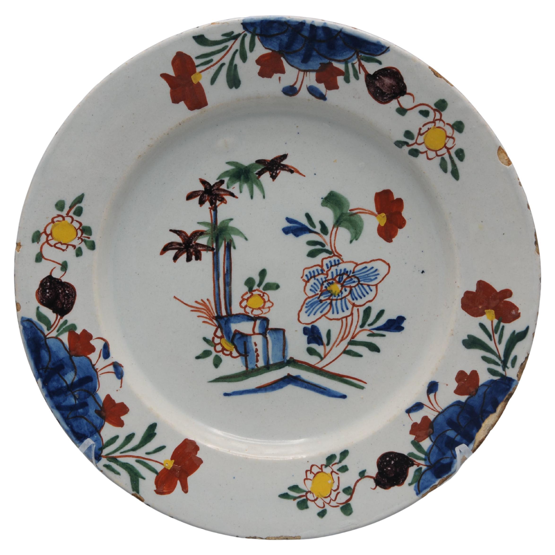 Delft - Delftware plate with polychrome floral decor - mid 18th century For Sale
