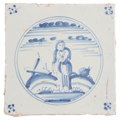 Delfter Fayencefliese mit einem Mädchen in einer Landschaft, um 1700