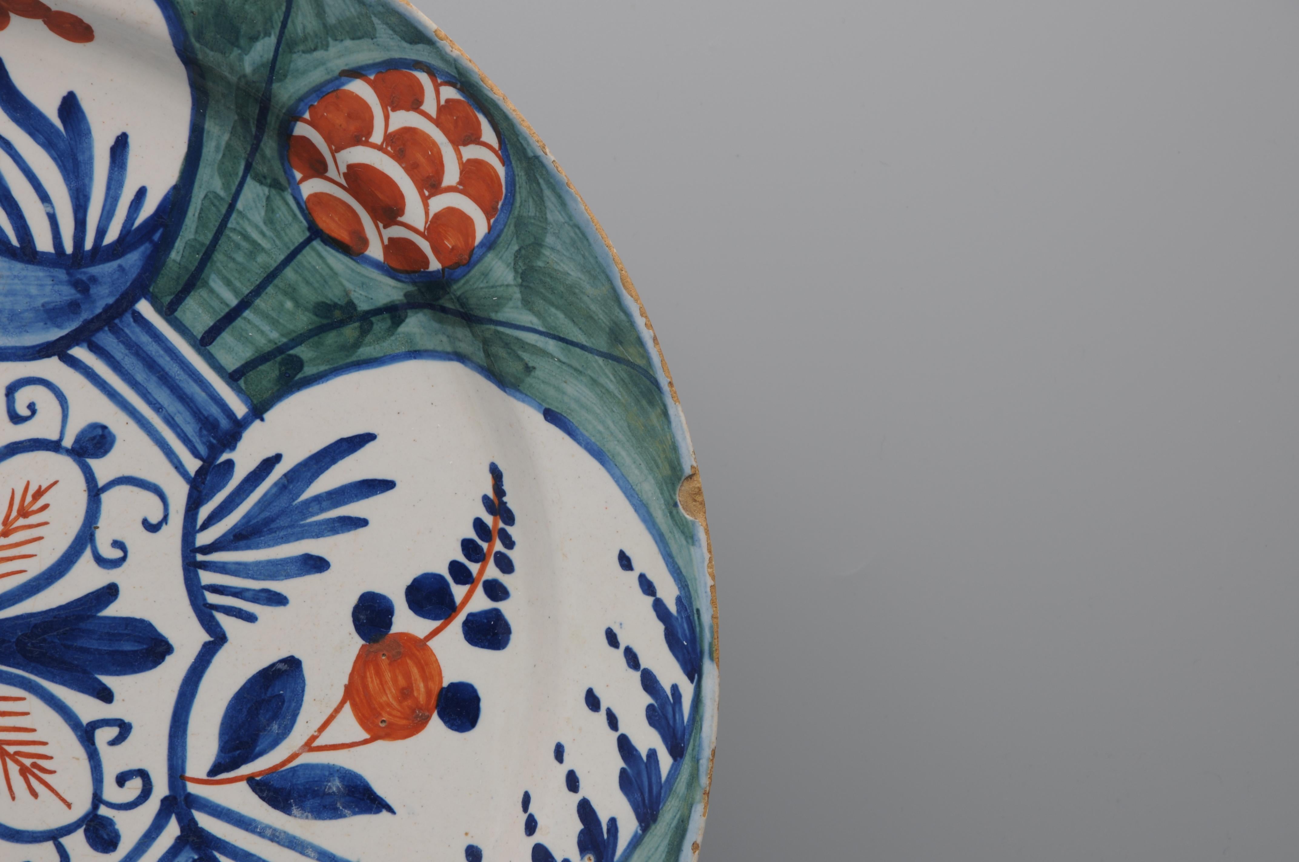 18th Century Delft - Large green and polychrome 'Four Hearts' charger -  mid 18th century For Sale