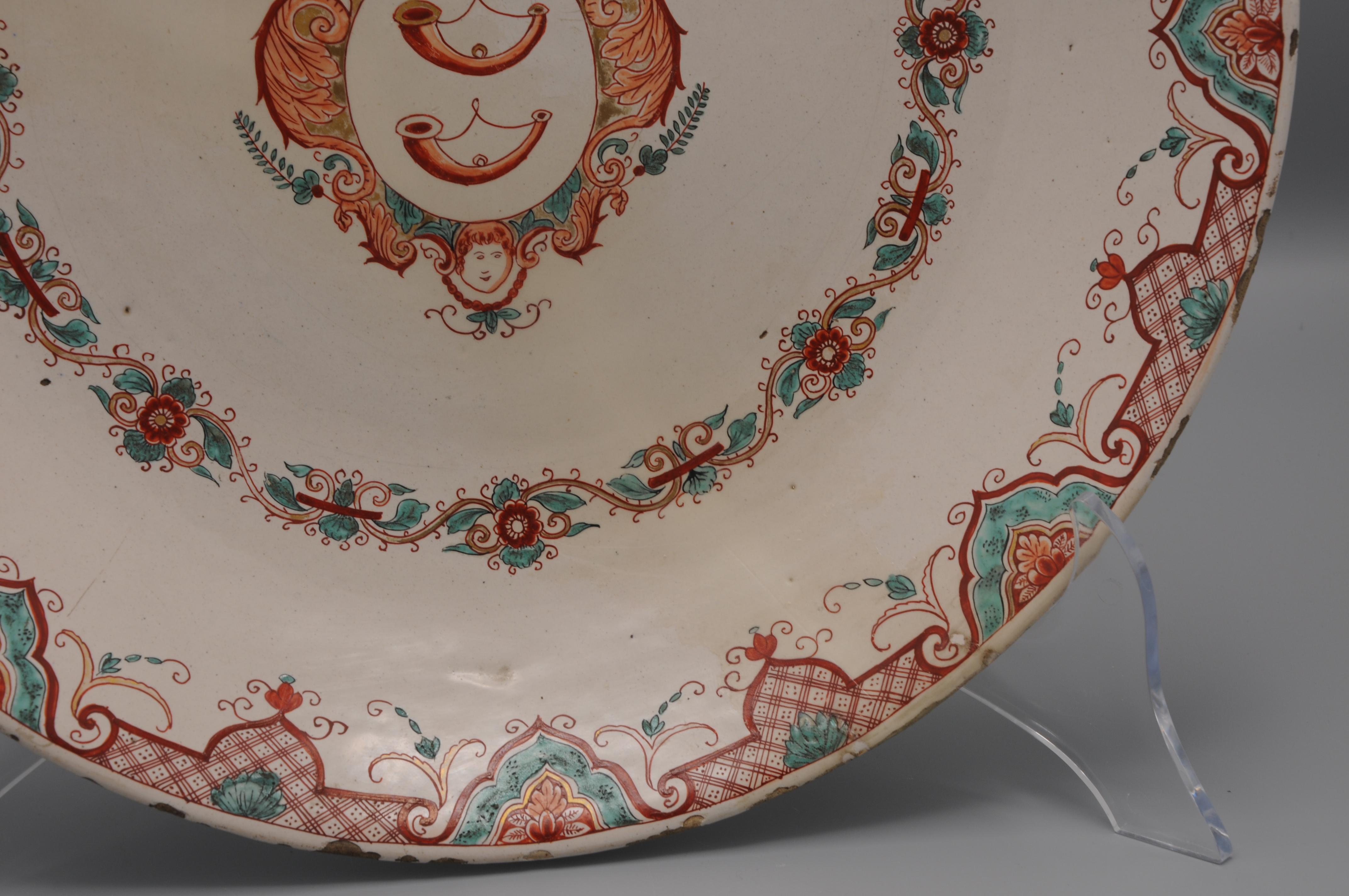 Dutch Delft - Large polychrome 'petit feu' armorial charger - mid 18th century For Sale