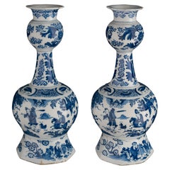 Delft Pair of blue and white garlic-head chinoiserie bottle vases 1680-1690