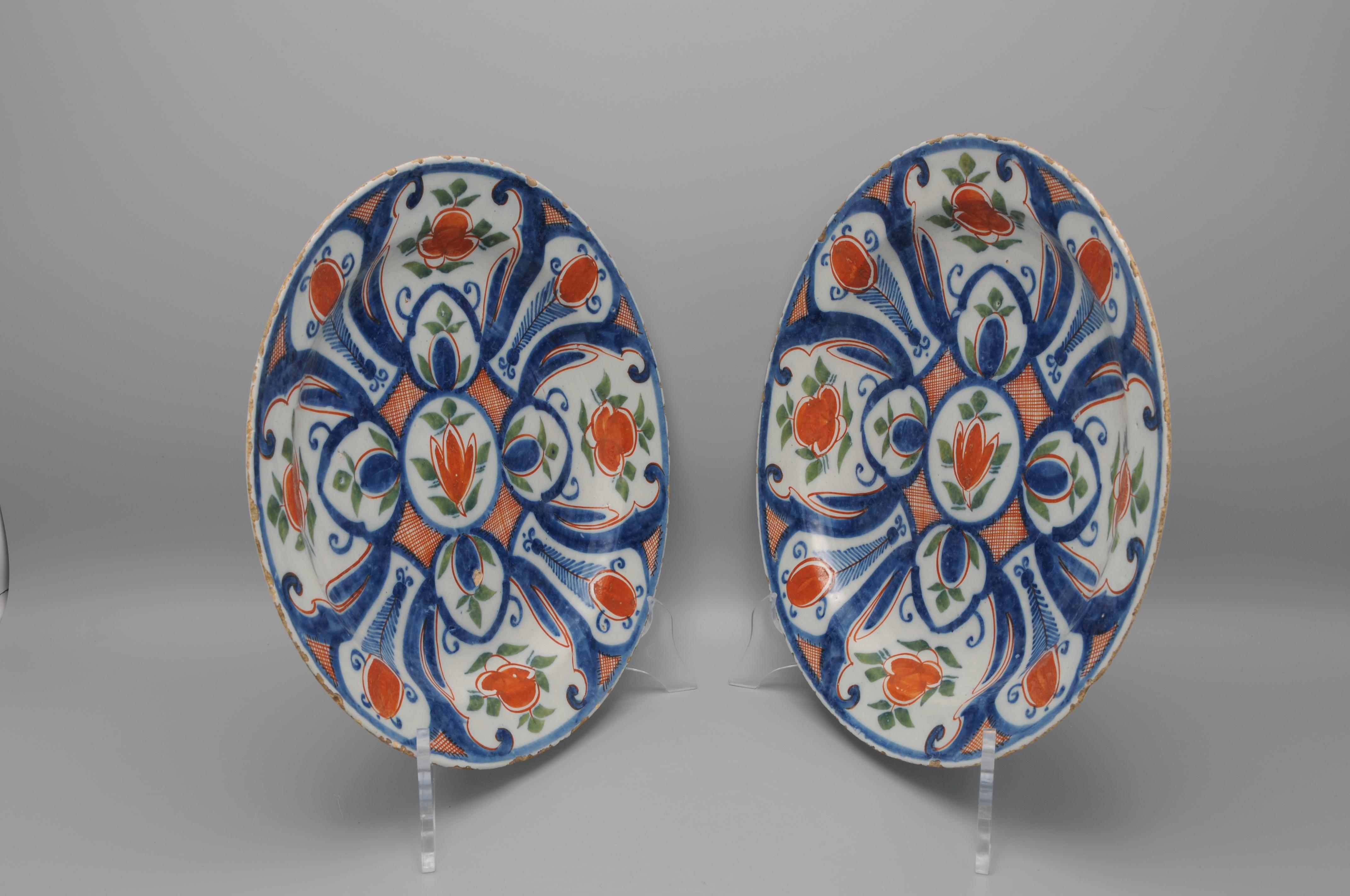 Delft - Pareja de platos azules, verdes y naranjas de 