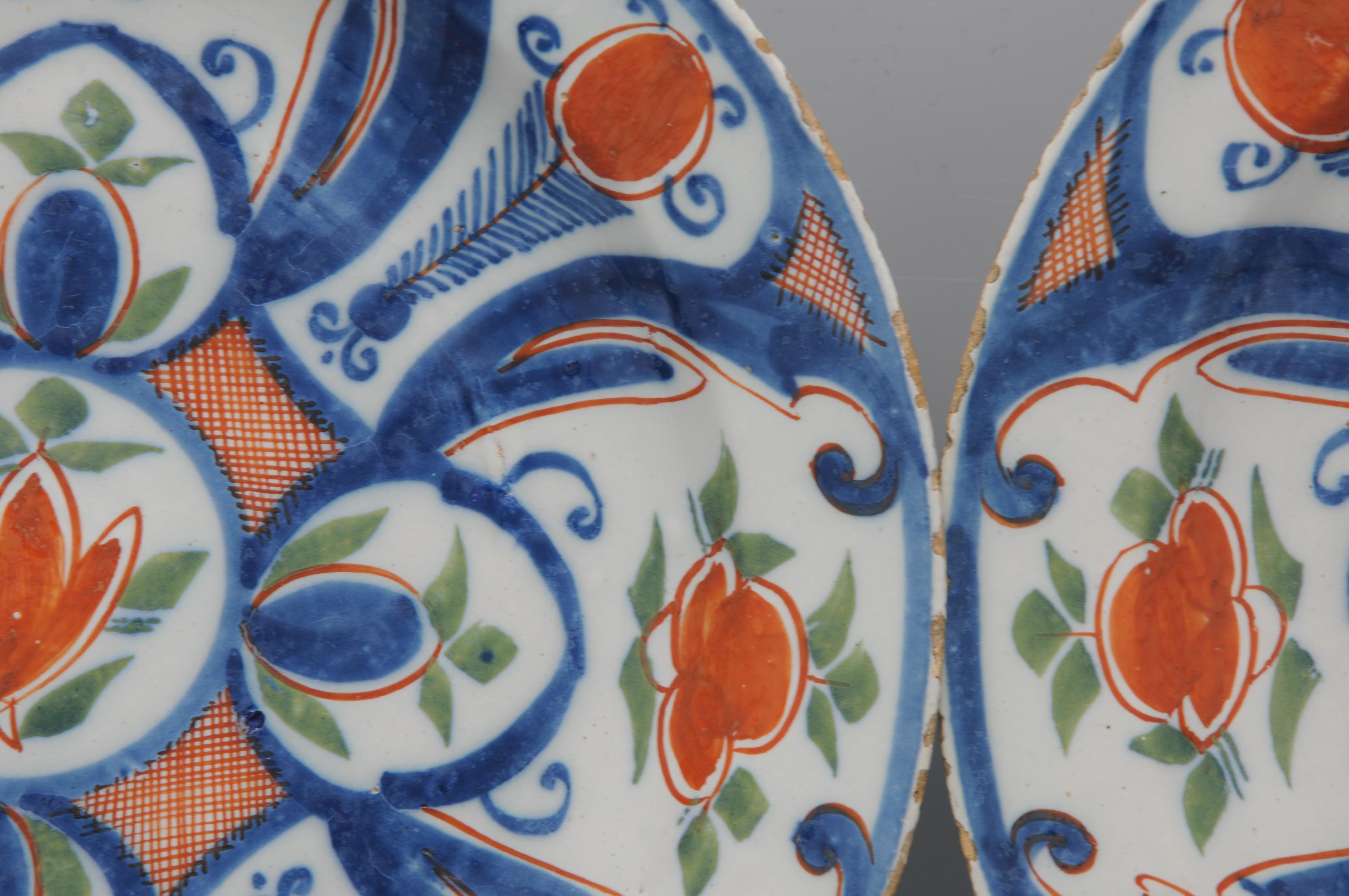 Delft - Pareja de platos azules, verdes y naranjas de 