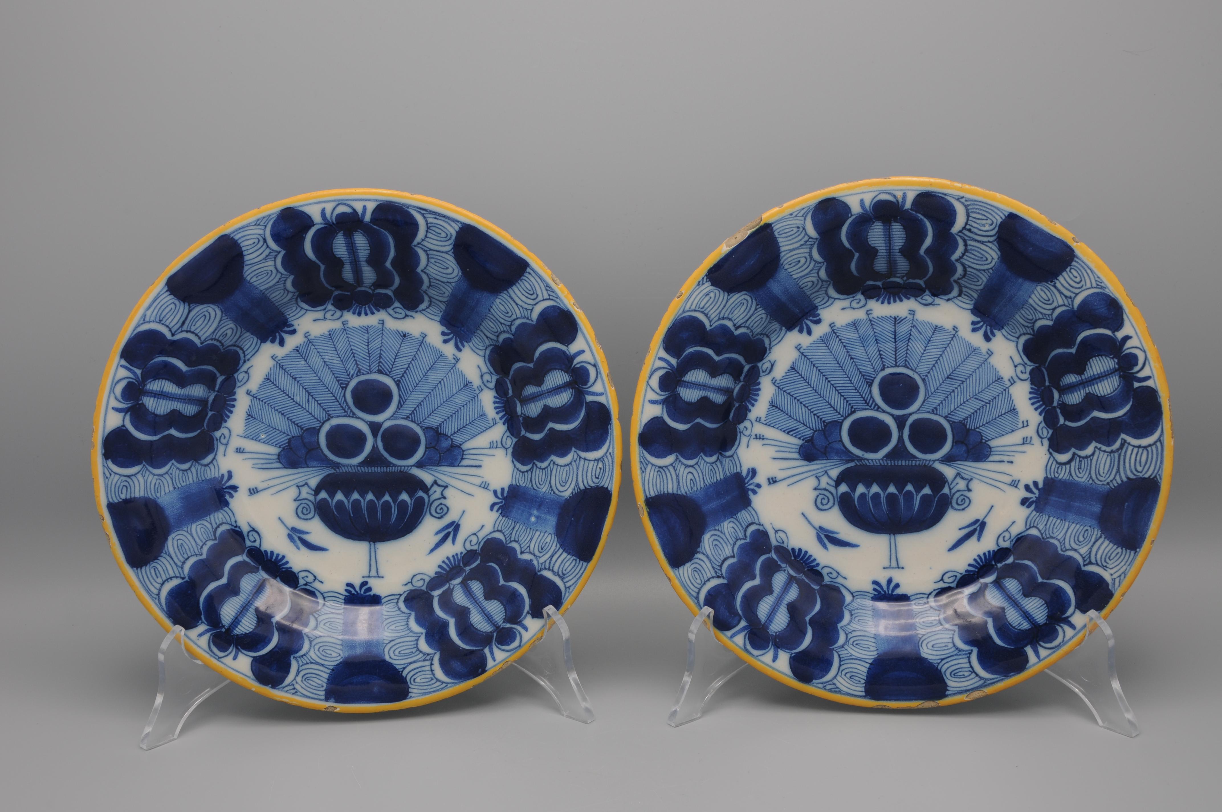 Dutch Delft pair of 'Peacock' plates by 'De Blompot' - second half 18th century For Sale