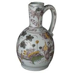Antique Delft, polychrome chinoiserie wine jug circa 1680 in purple, yellow and green