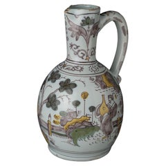 Delft, polychrome chinoiserie wine jug circa 1680 in purple, yellow and green