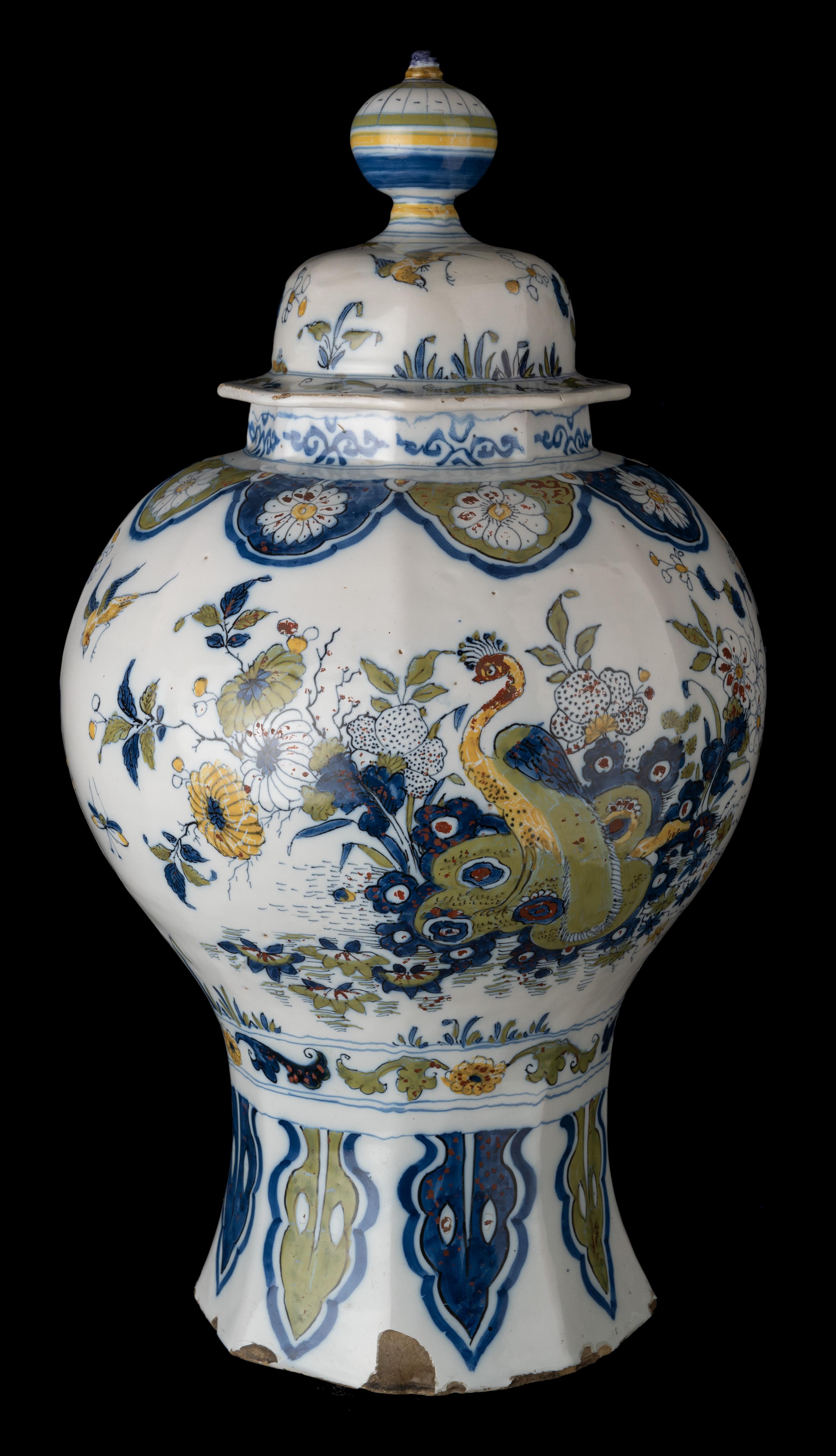 Polychrome covered jar with peacock and dragon in a landscape. Delft, 1690-1700 
The Peacock pottery [attributed to] 

The octagonal baluster jar with lid is painted in polychrome with a peacock and a mythical dragon in a water landscape. On the