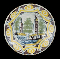 Delft Polychrome majolica dish with a village view The Netherlands, 1700-1750