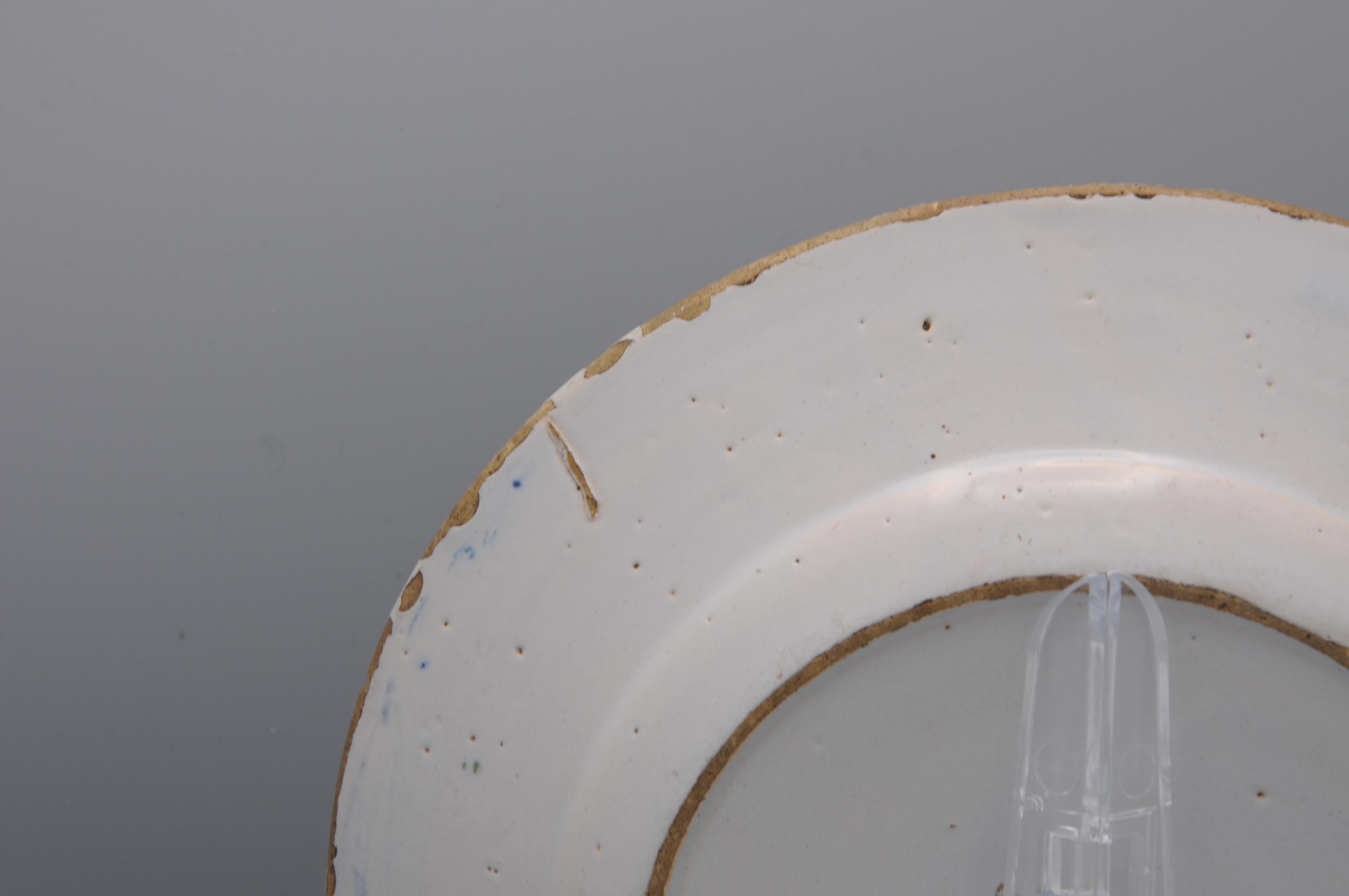 Poterie Assiette polychrome 'boerendelfts' de Delft - début du 19ème siècle en vente
