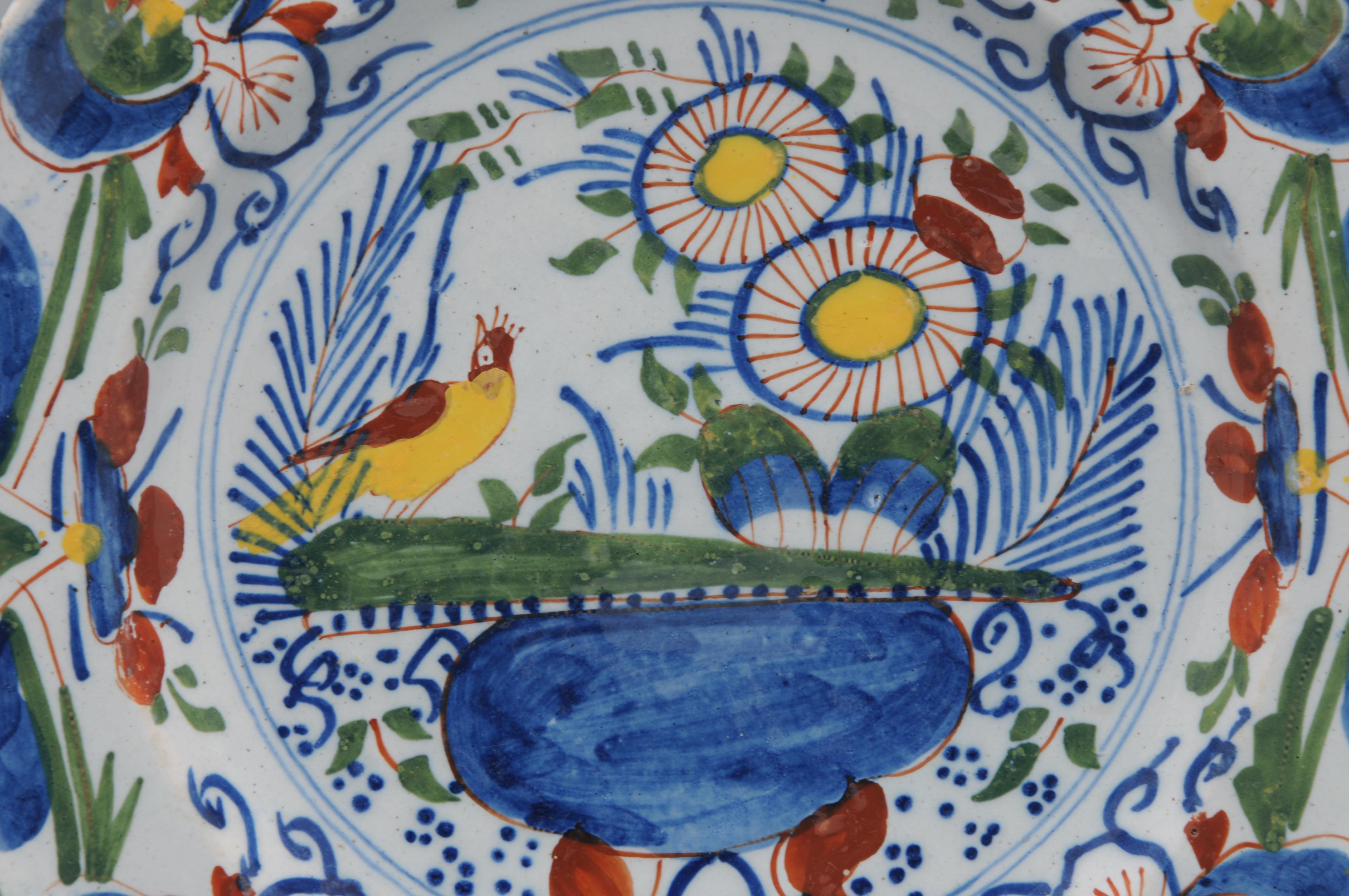18th Century Delft, Polychrome plate with bird and flower vase - 18th century