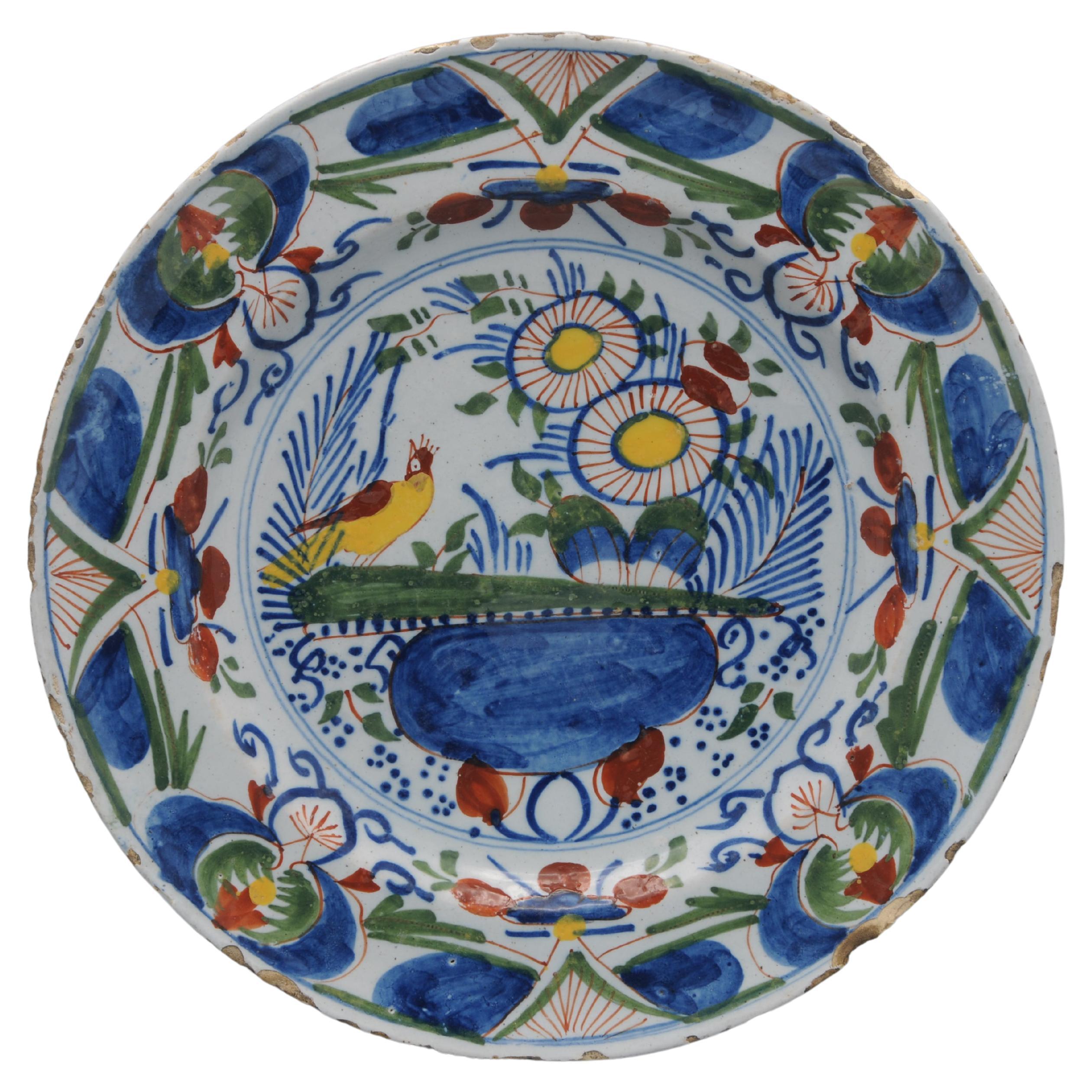 Delft, Polychrome plate with bird and flower vase - 18th century