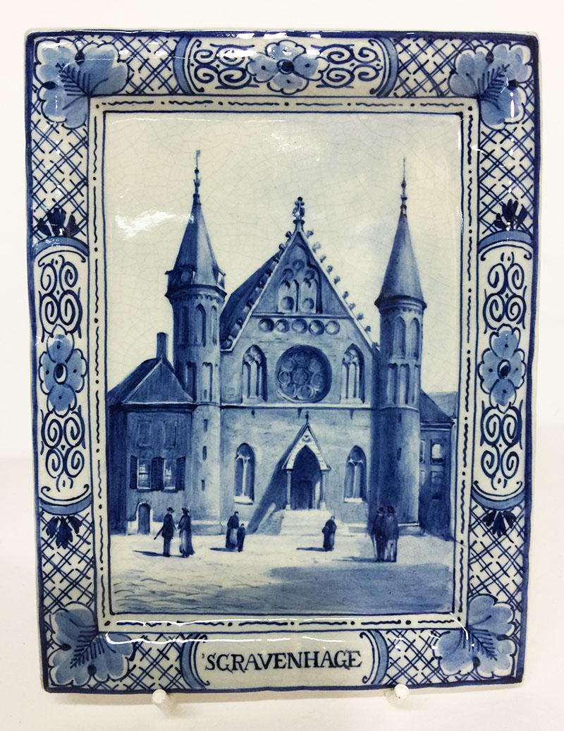 Delft Porceleyne Fles small wall plates, The Hague and Delft, 1894 and 1912

3 Dutch Delft Porceleyne Fles rectangular small wall plates with floral borders

Plate 1 is 's-Gravenhage (The Hague) 
The Maurits or Grenadiers gate was completed in