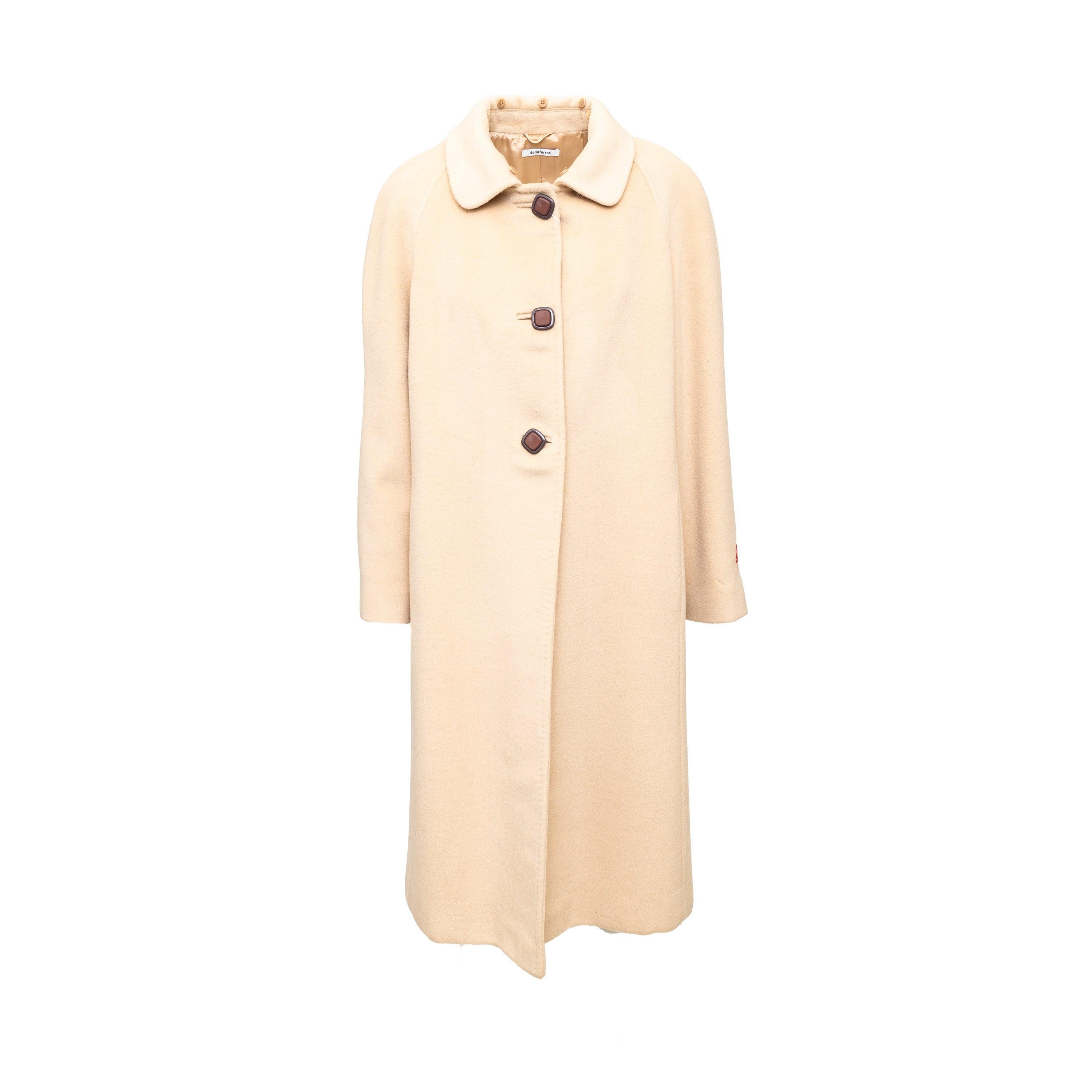 The Delia Ferrari Wool and Fur Coat in soft cream boasts a removable fox fur collar, long silhouette, and 3-button closure with wooden accents for a chic finish.
 Remarks: It is in unused condition with tags. There are some holes in the lining and