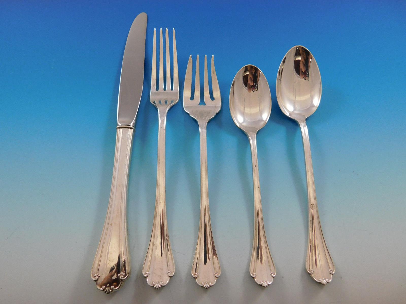 Gorgeous Delicacy by Lunt sterling silver Flatware set, 42 pieces. This set includes:

Eight knives, 9