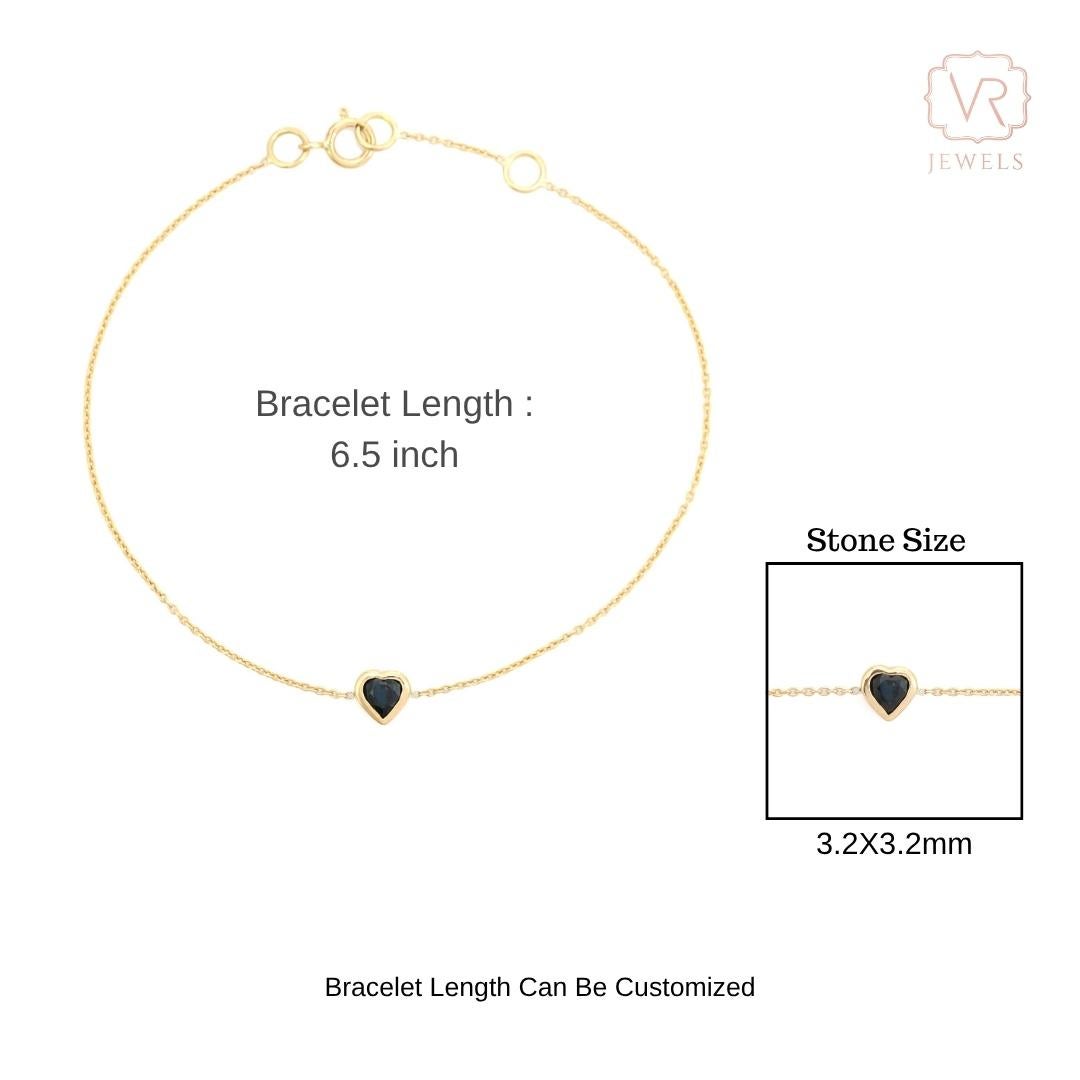 Delicada pulsera de cadena de oro de 14 quilates con zafiro azul en forma de corazón engastado en bisel en venta 8