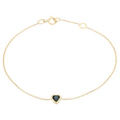 Delicada pulsera de cadena de oro de 14 quilates con zafiro azul en forma de corazón engastado en bisel