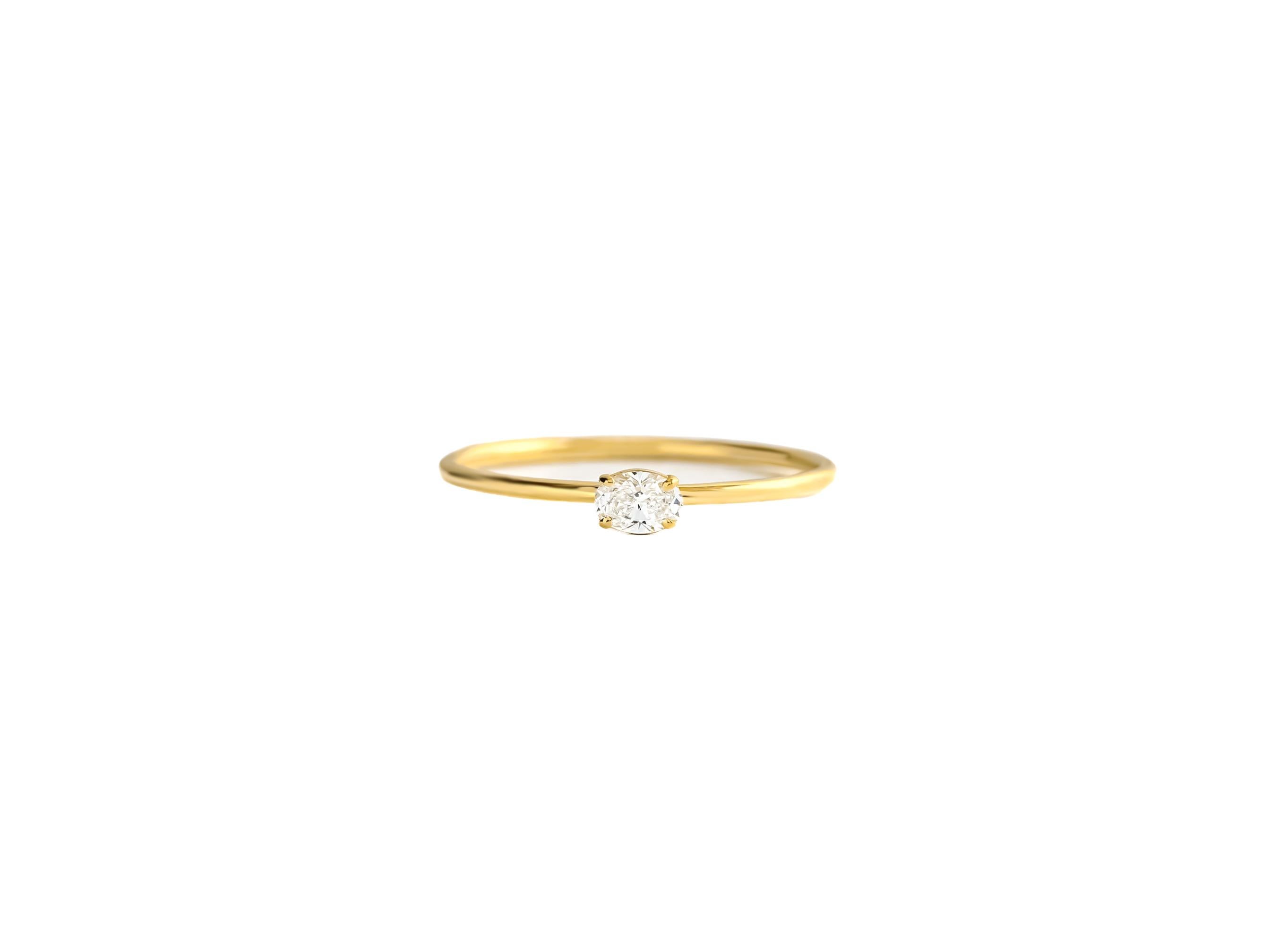 Modern Delicate 14k gold ring with oval moissanite  For Sale