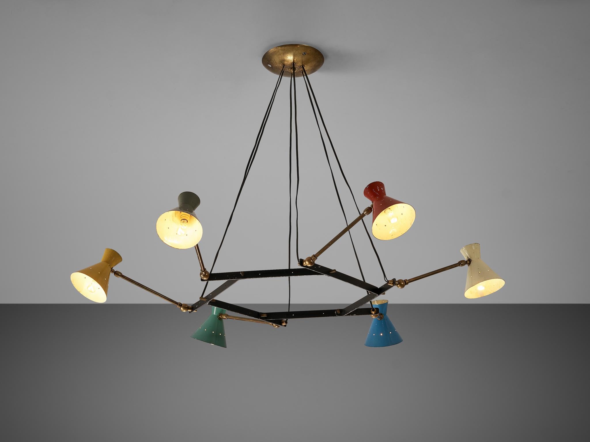 Chandelier, metal, brass, Italy, 1950s

Beautiful Italian chandelier with colorful cone shaped shades. A round brass fixture adjusts the lamp to the ceiling. Six wires connect the ceiling fixture with the lamps. A polygonal frame in metal holds