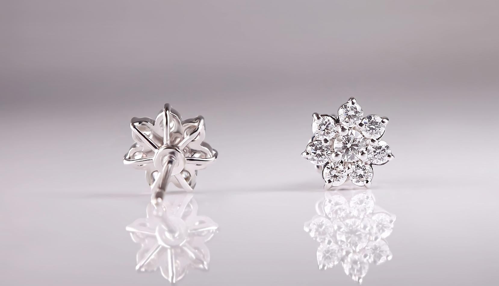 Round Cut Delicate Bloom: Diamond-adorned Flower Earrings in White Gold For Sale