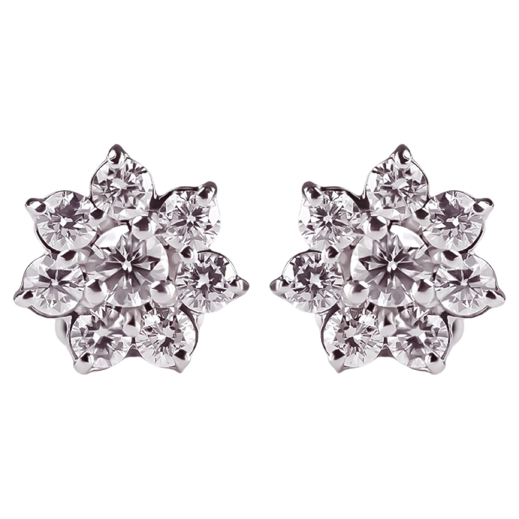 Delicate Bloom: Diamond-adorned Flower Earrings in White Gold For Sale
