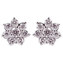 Delicate Bloom: Diamond-adorned Flower Earrings in White Gold