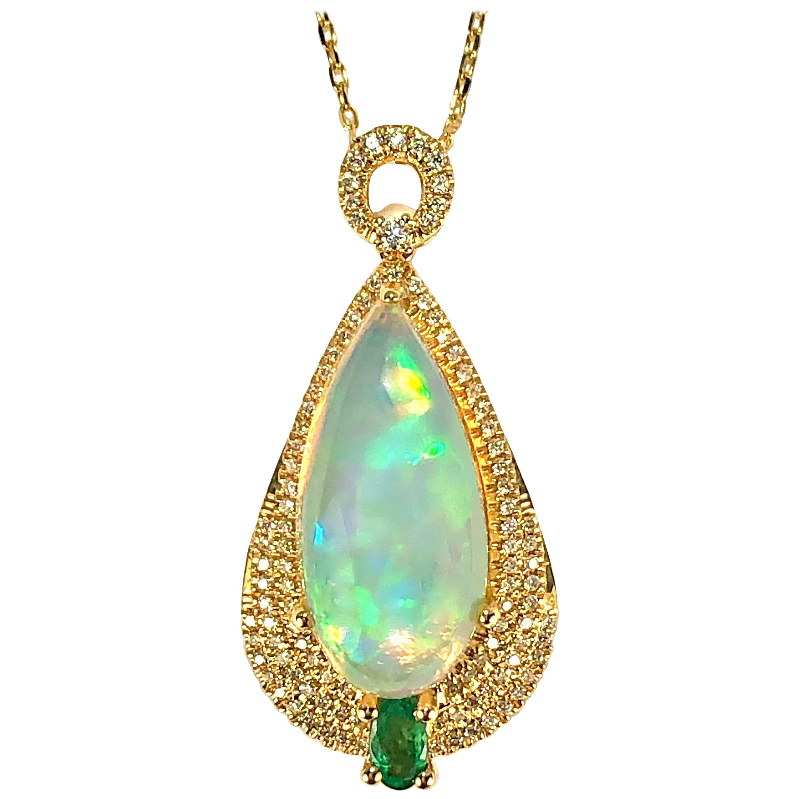 Delicate "Contra Luz" Opal Pendant with Diamonds and One Emerald on a Gold Chain