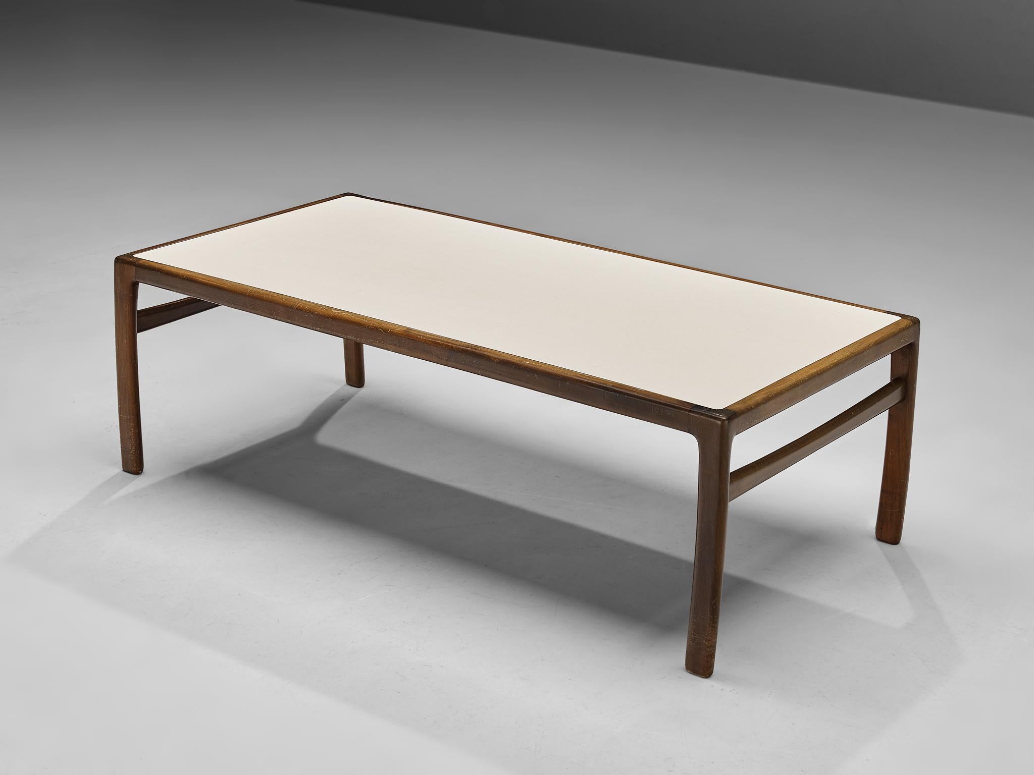 Coffee table, walnut, laminated wood, Denmark, 1960s

This coffee table contains a white high-gloss laminated top, a solid walnut frame and fully resembles designs of the Danish designer Tue Poulsen. The white color of the table top creates a vivid