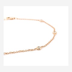 Delicato braccialetto con stazione di diamanti in oro rosa 14 carati