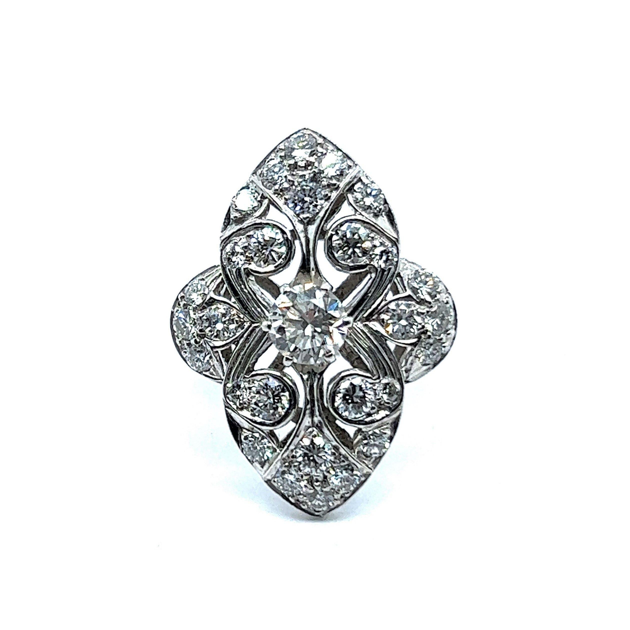 A delicate piece, a fantasy with a floral motif, this ring is the perfect embodiment of sophistication and symmetry. 

The composition attracts by its unusual materials combination - finest sterling silver merges with 28 brilliants of G-H colour and