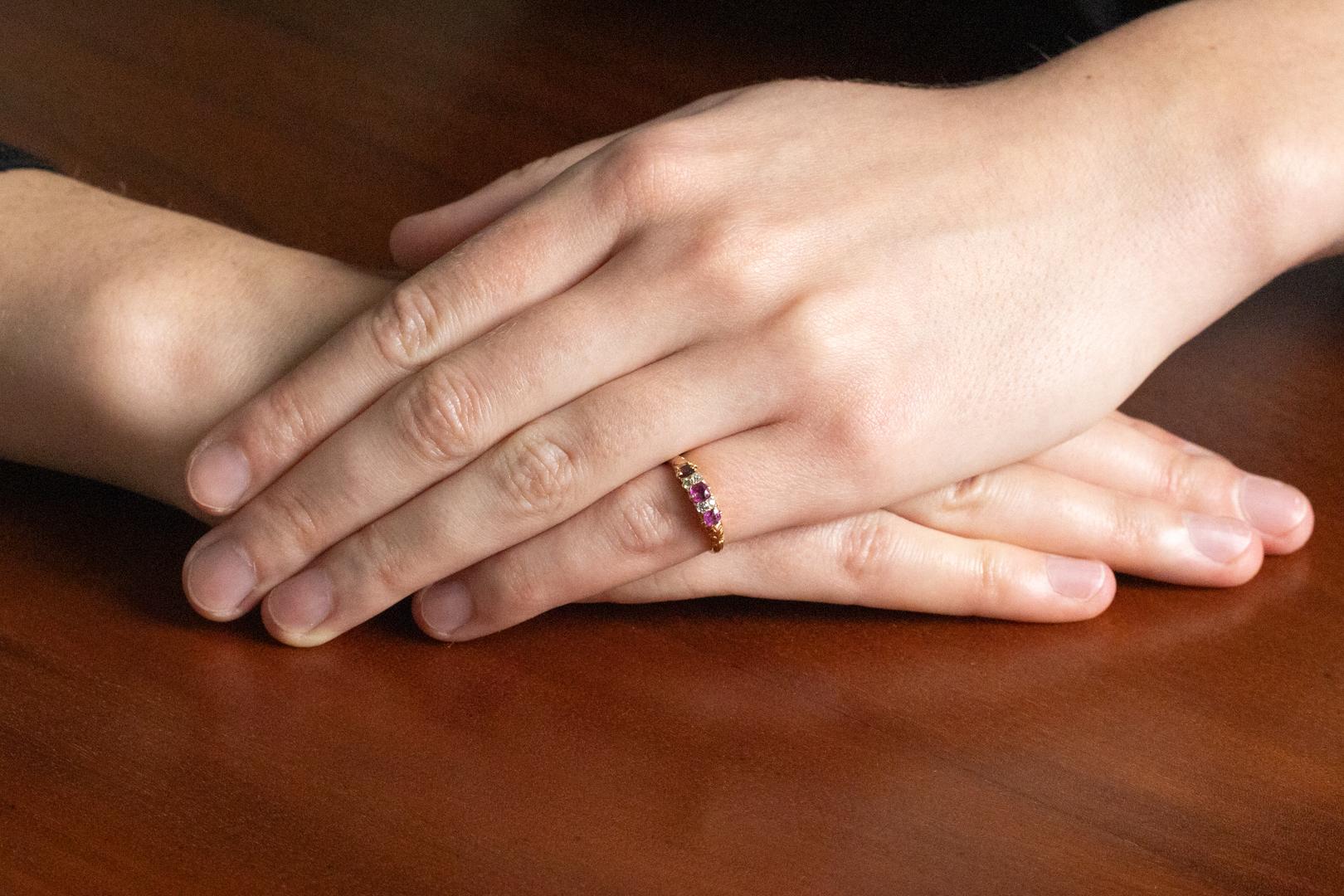 Delicate antique ring made of 14-karat gold (0.585) with three faceted rubies (traces of use) and diamonds in an old cut 8/8 (totalling approx. 0.12 ct; color I; clarity SI-P1)

Weight: 2 g,

Size: 8 (48) - ask about the possibility of size