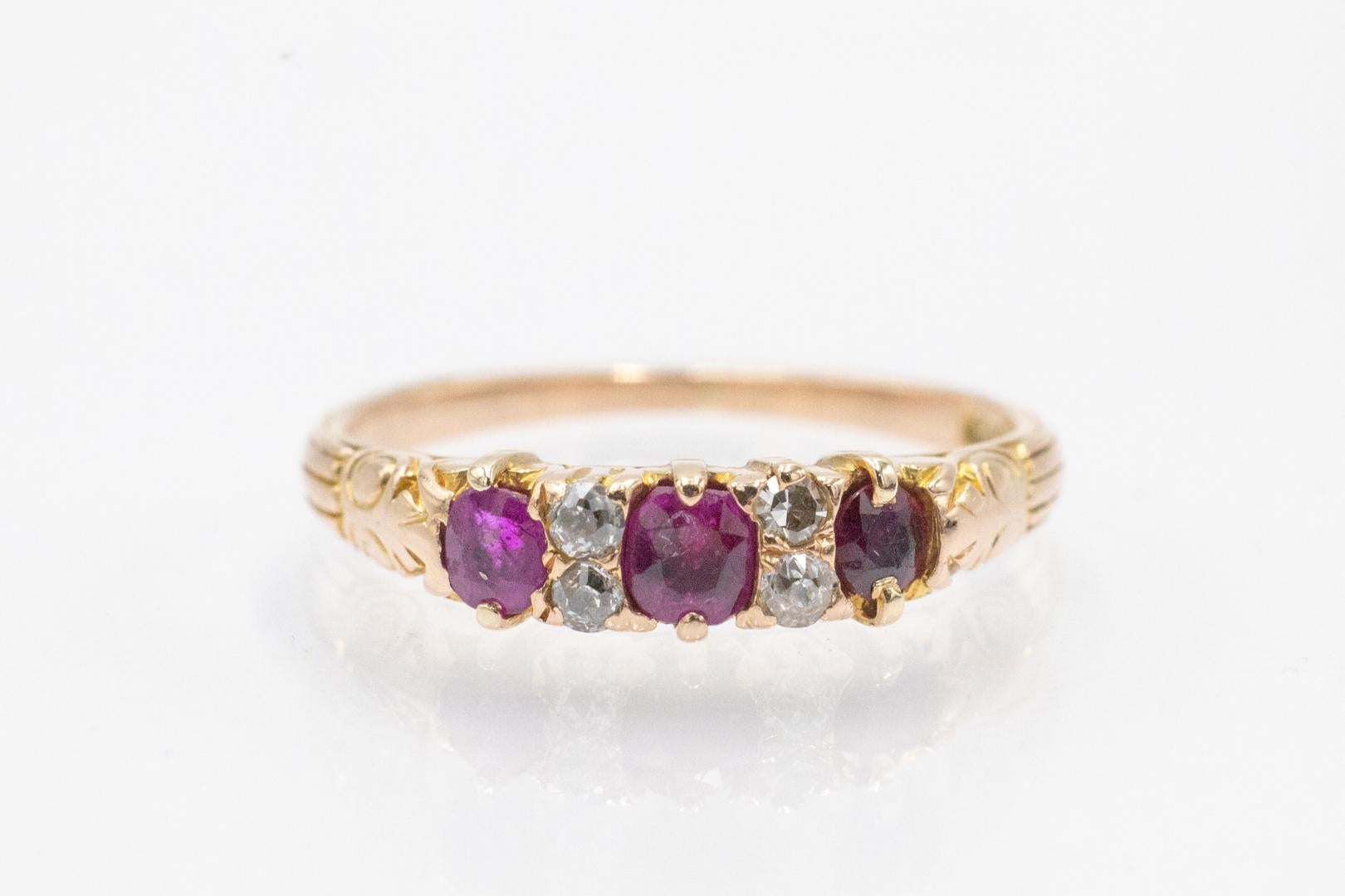 Late Victorian Delicate gold ring with rubies and diamonds. For Sale