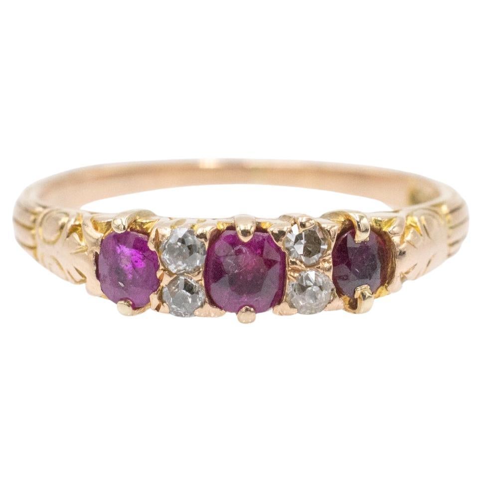 Delicate gold ring with rubies and diamonds. For Sale